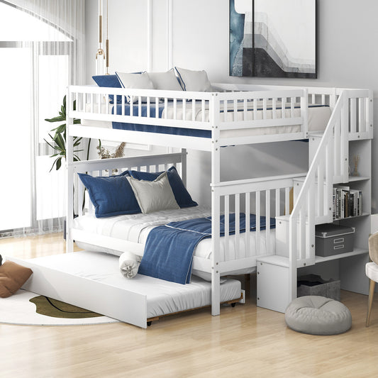 White wooden triple bunk bed with pullout trundle navy bedding and storage stairs