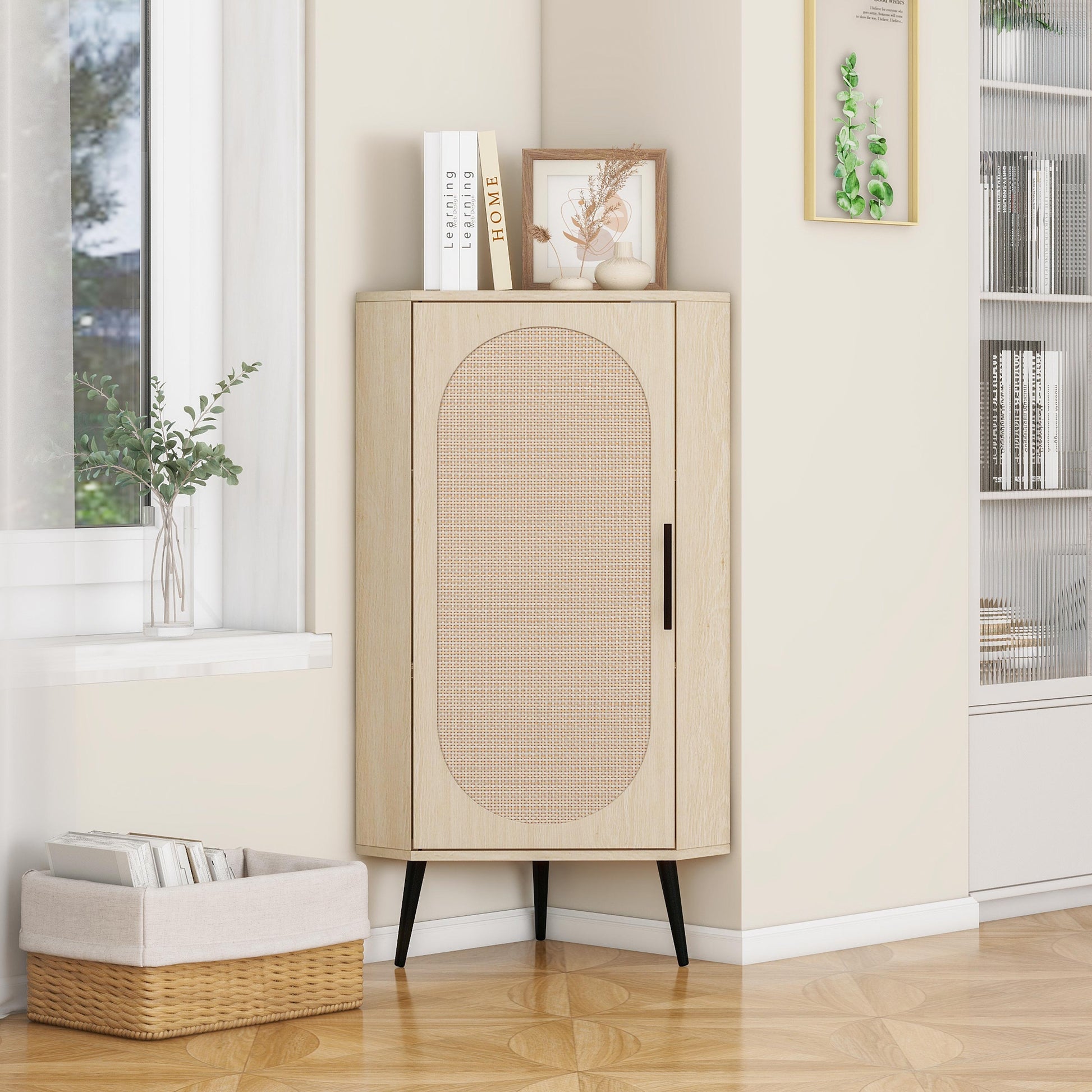 Light wood corner cabinet with woven cane door panel and black legs perfect for small spaces