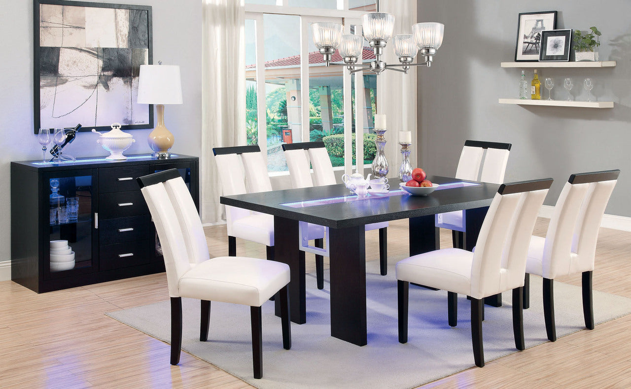 Modern black dining table with LED accents and white upholstered chairs