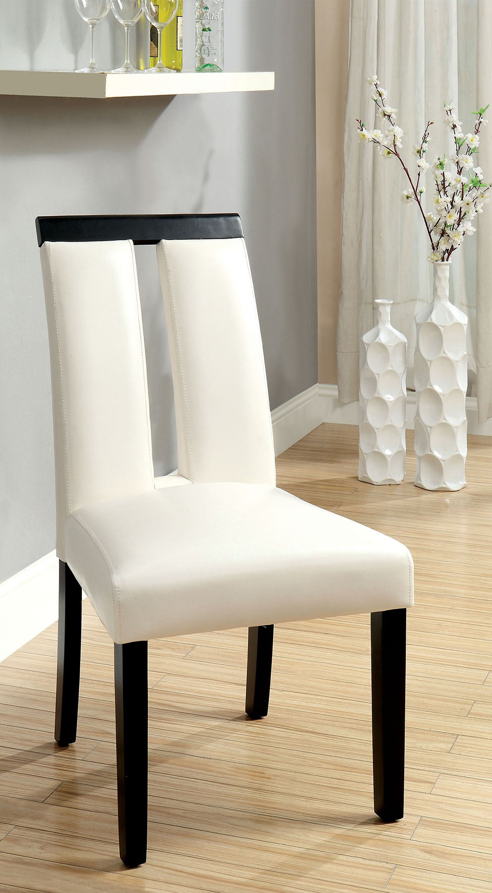 Cream leather dining chair with split back and black legs