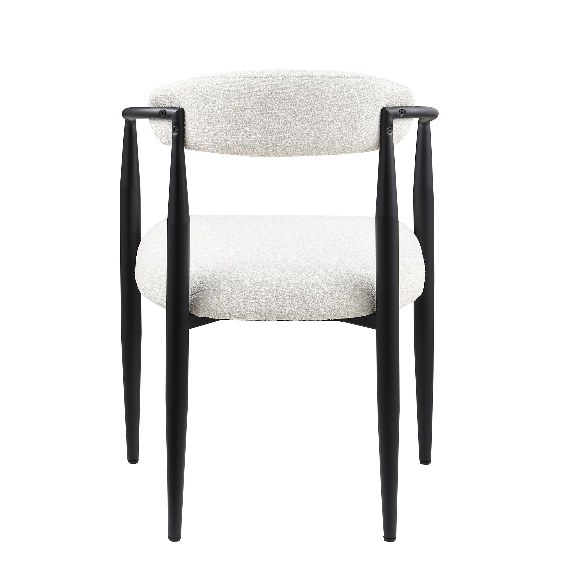 Boucle fabric dining chair with tapered black legs and rounded arms
