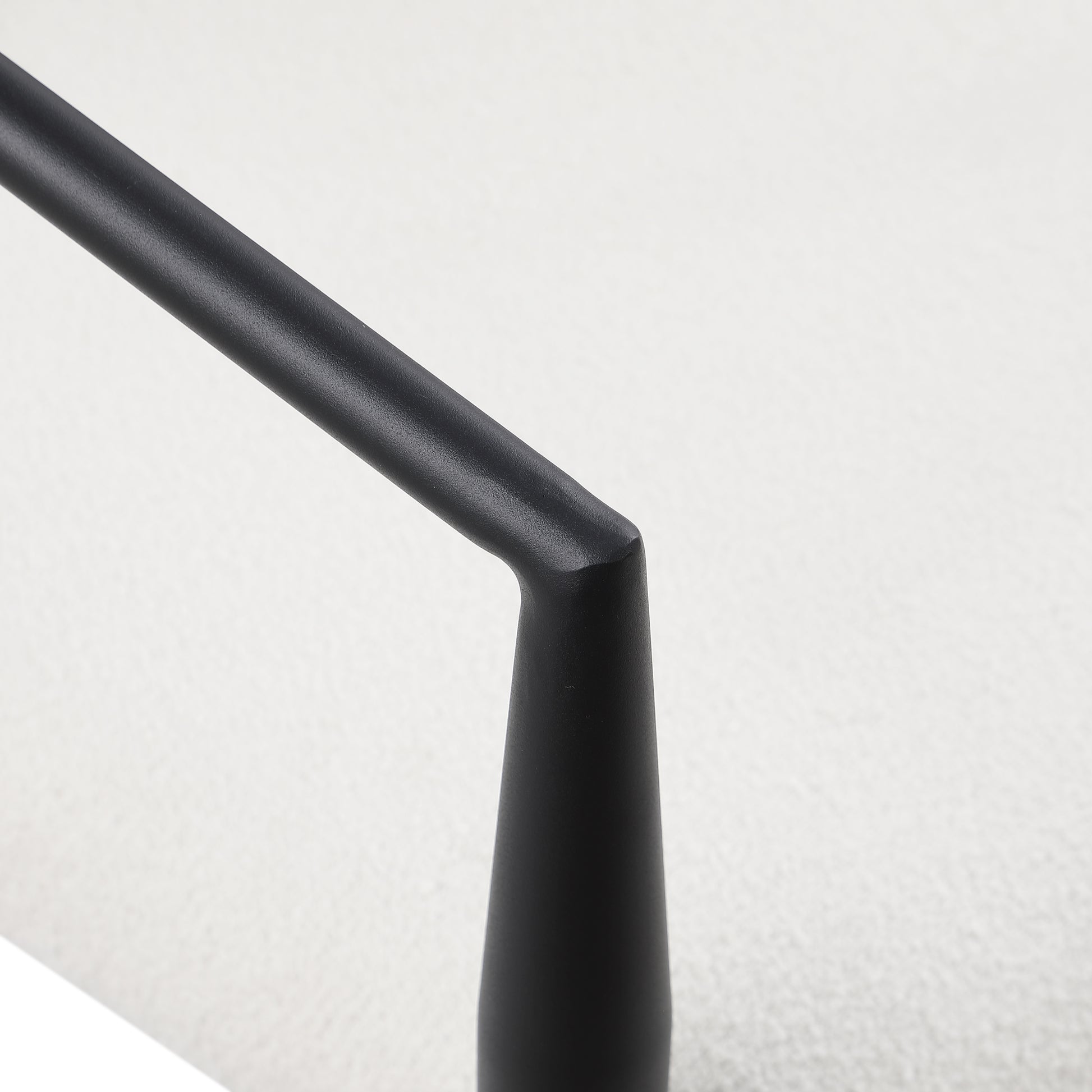 Black metal lamp arm with textured white shade