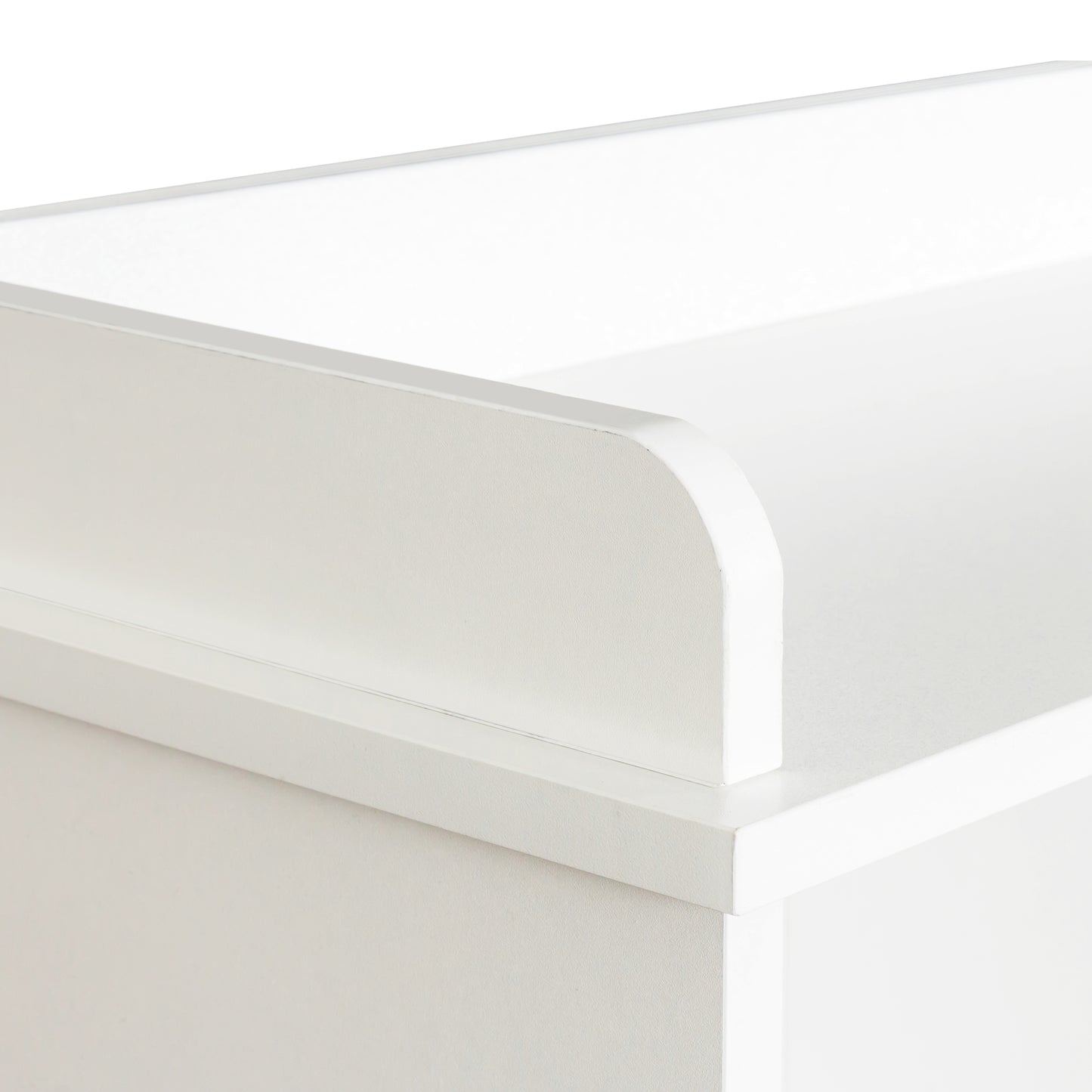Closeup of white baby changing table edge detail