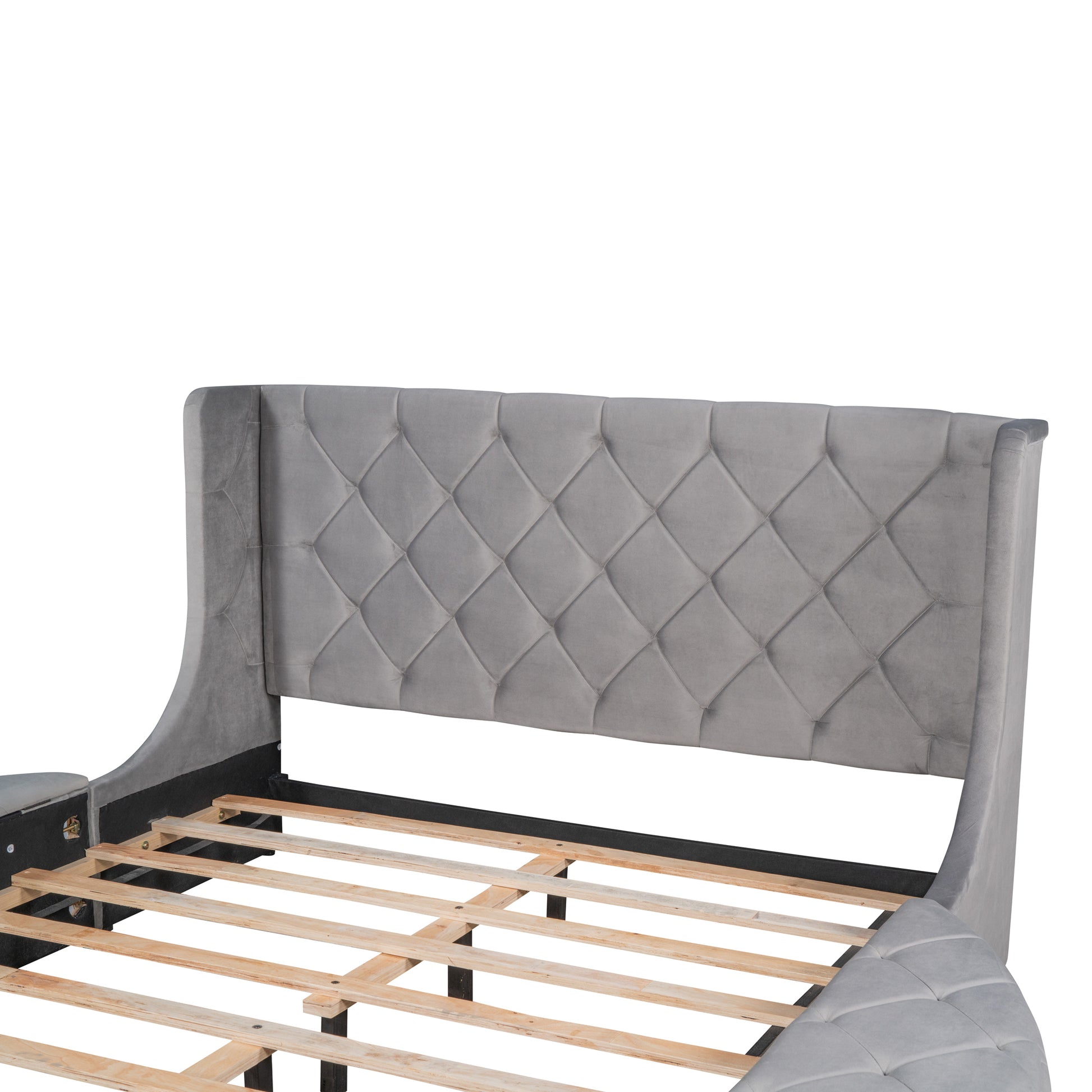 Grey velvet tufted wingback bed frame with wood slats and metal supports