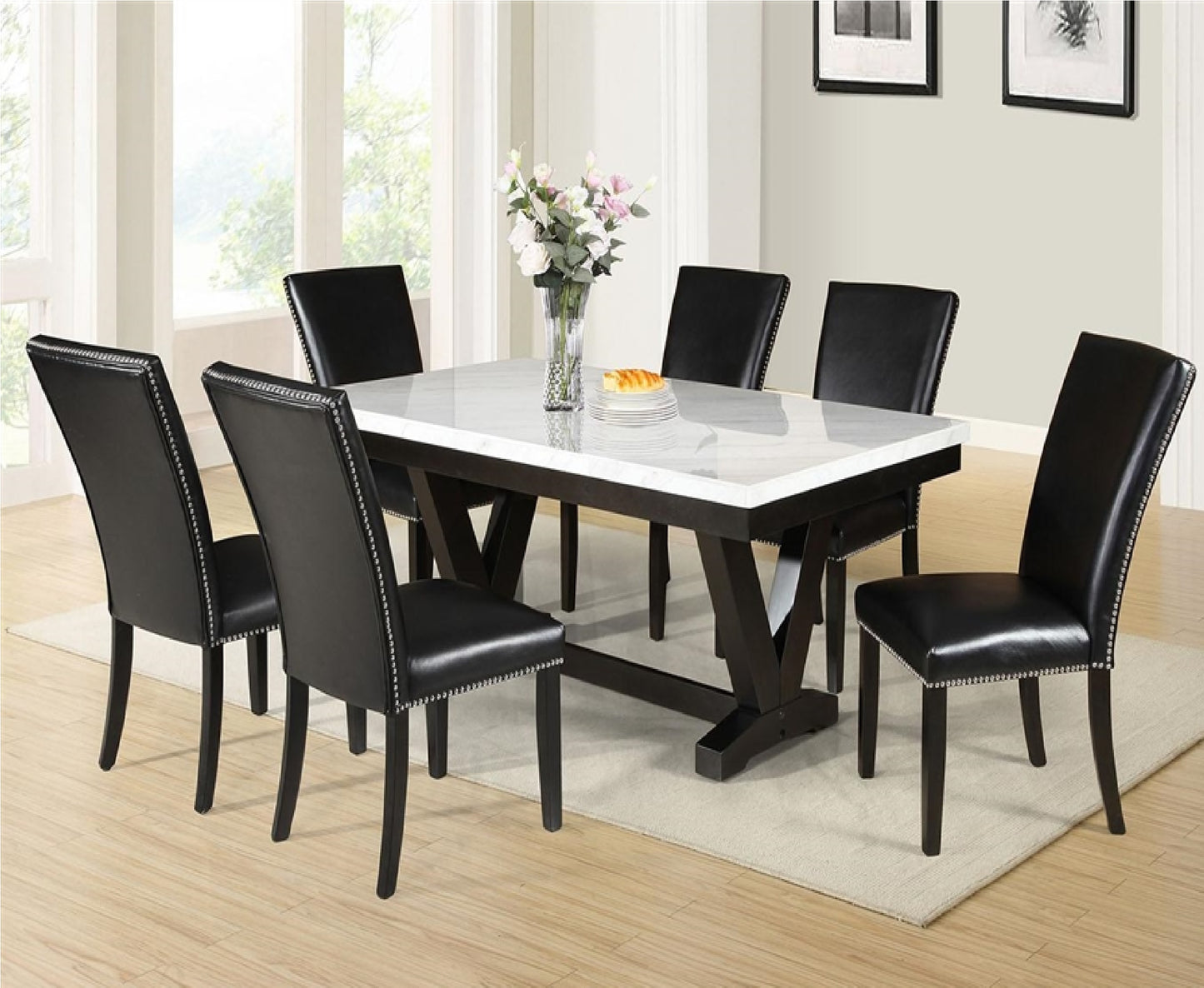 Modern marble dining table with six black faux leather chairs