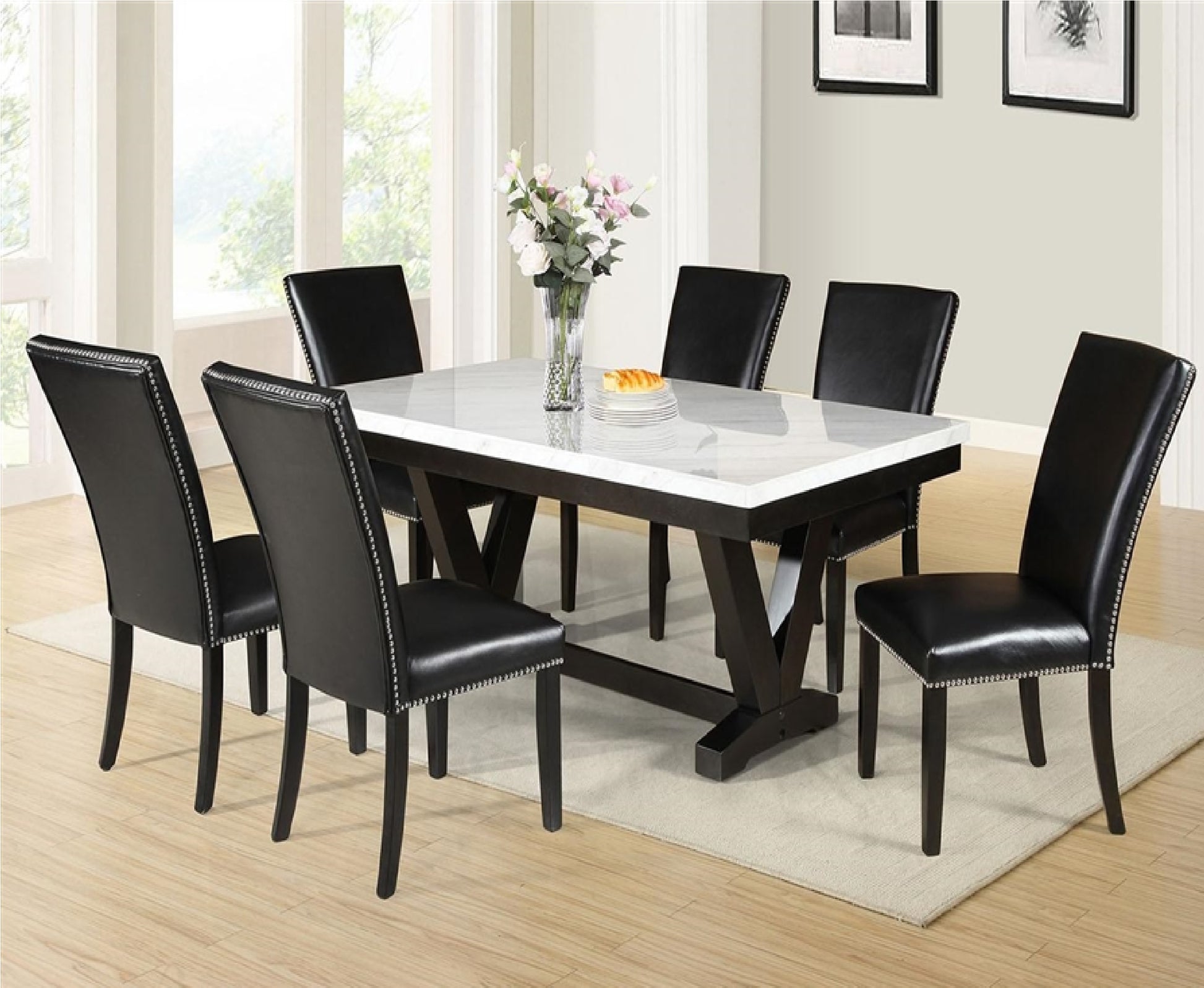 Modern marble dining table with six black faux leather chairs