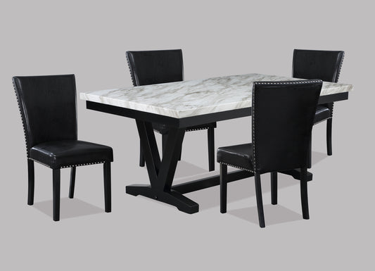 Modern faux marble dining table with four black leatherette chairs featuring silver nailhead trim