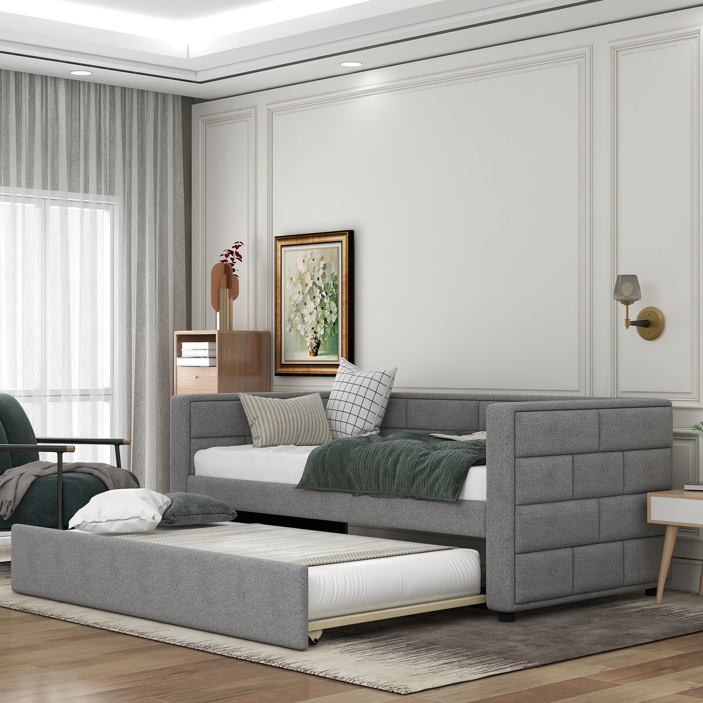 Gray upholstered daybed with pullout trundle perfect for guest rooms