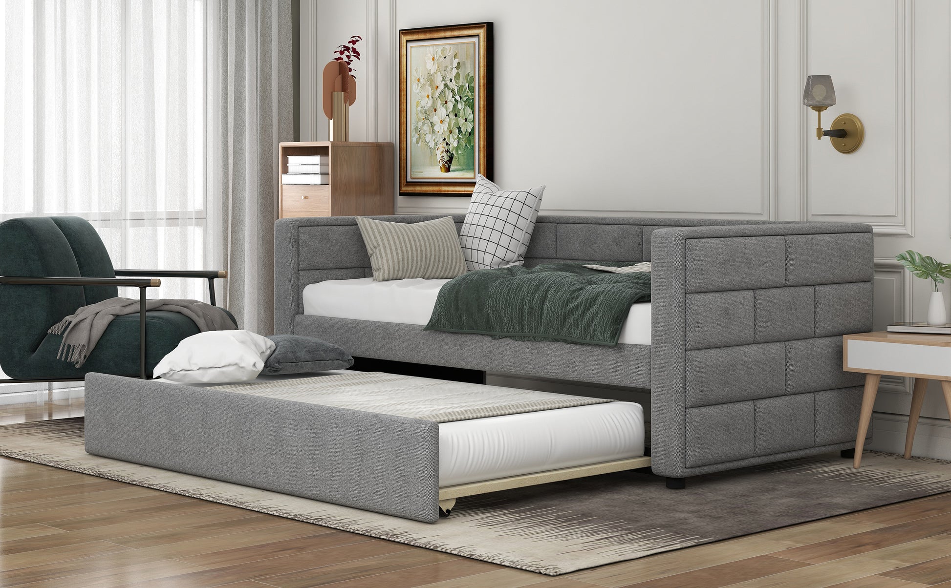 Gray upholstered daybed with a trundle perfect for guest rooms and small spaces