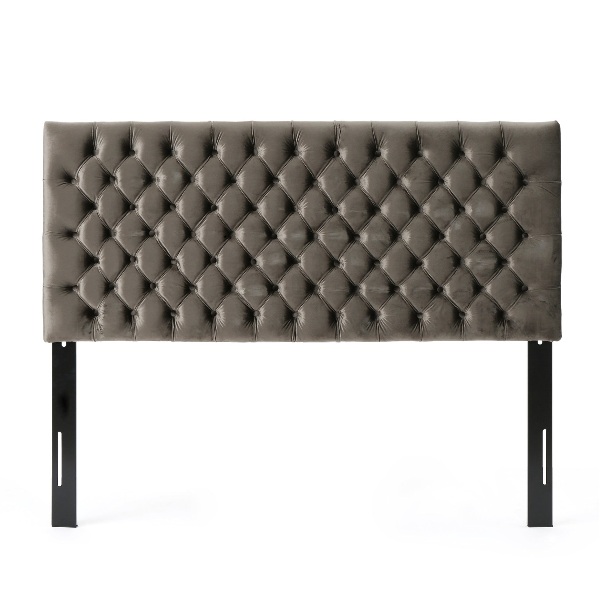 Grey velvet tufted headboard with diamond tufting and black metal legs