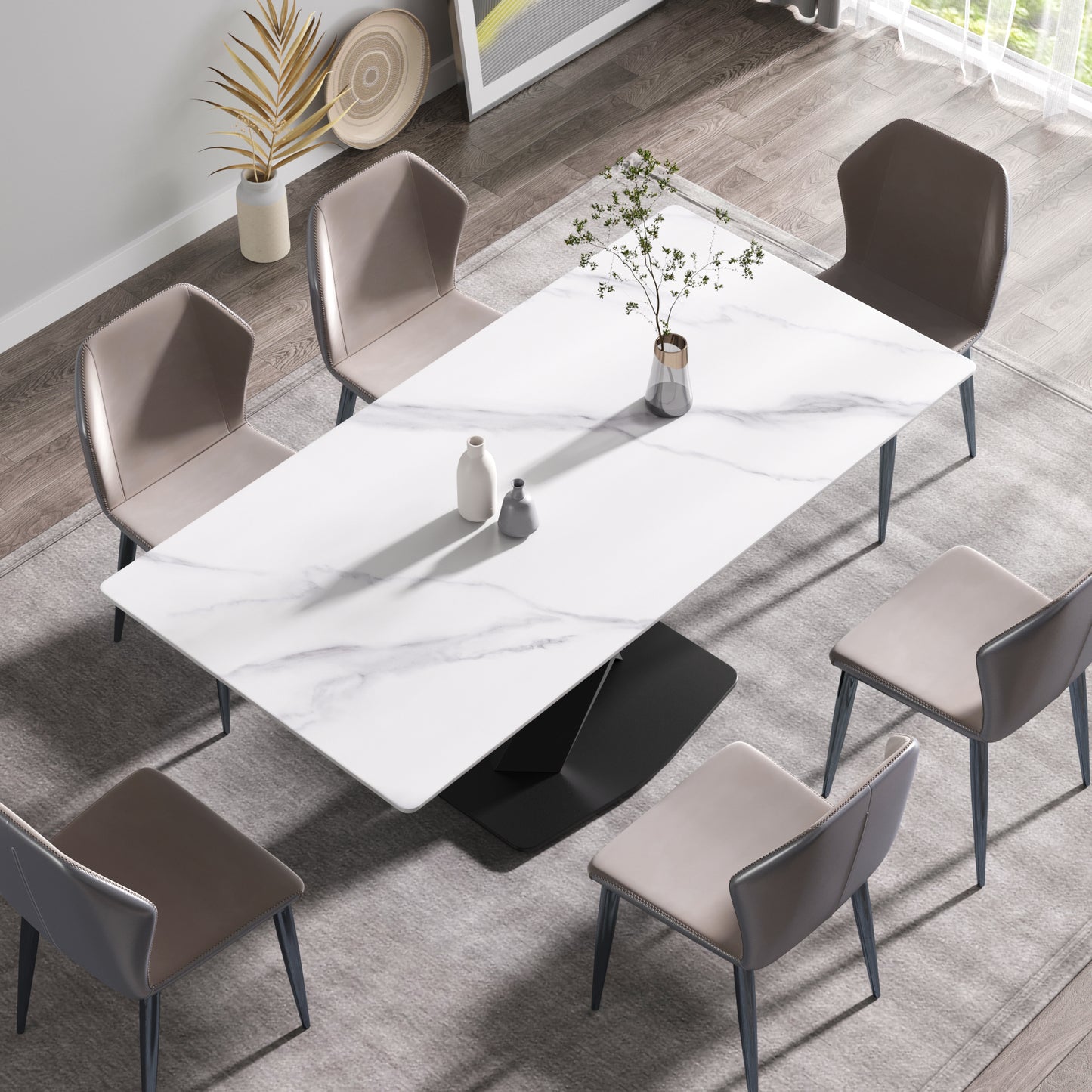 Modern white marble dining table with taupe leather chairs