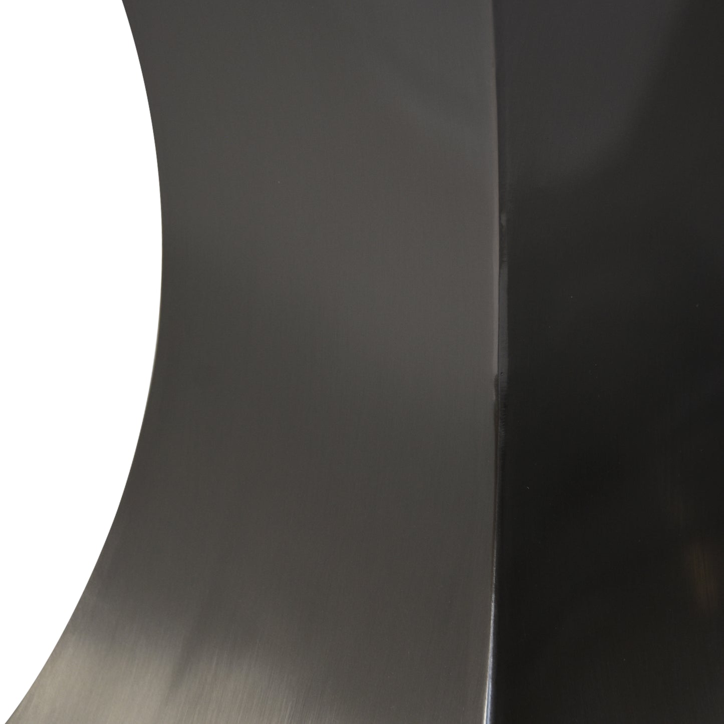 Brushed dark grey metal cylinder detail with clean edge