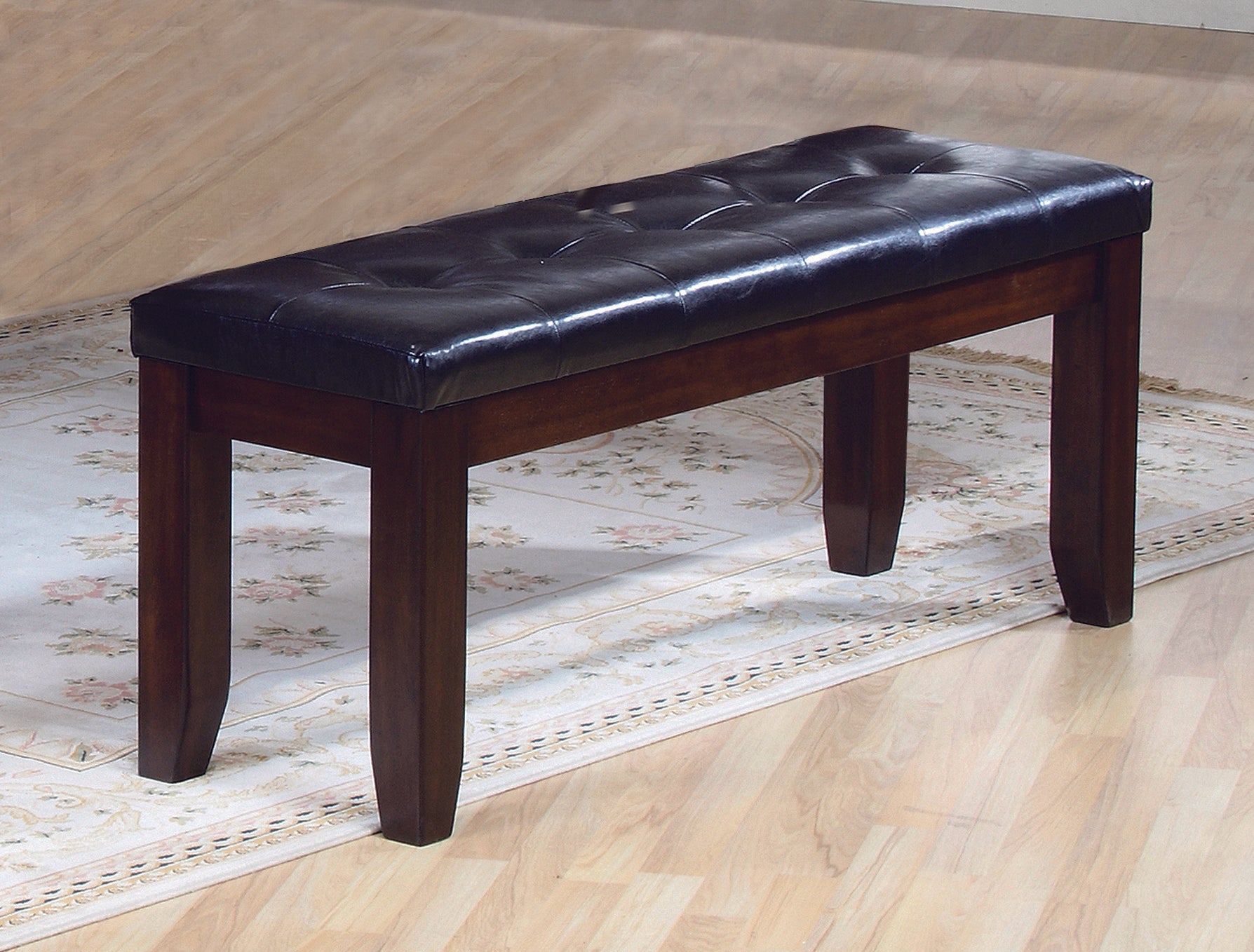Tufted dark brown faux leather bench with mahogany wood legs