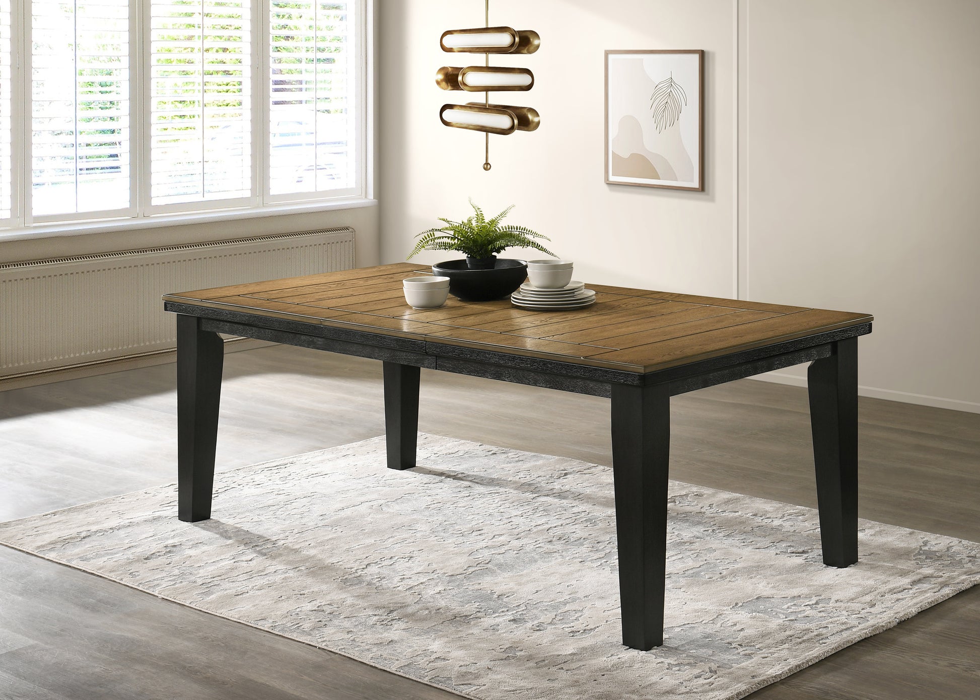 Modern dining table with warm wood planks and black legs