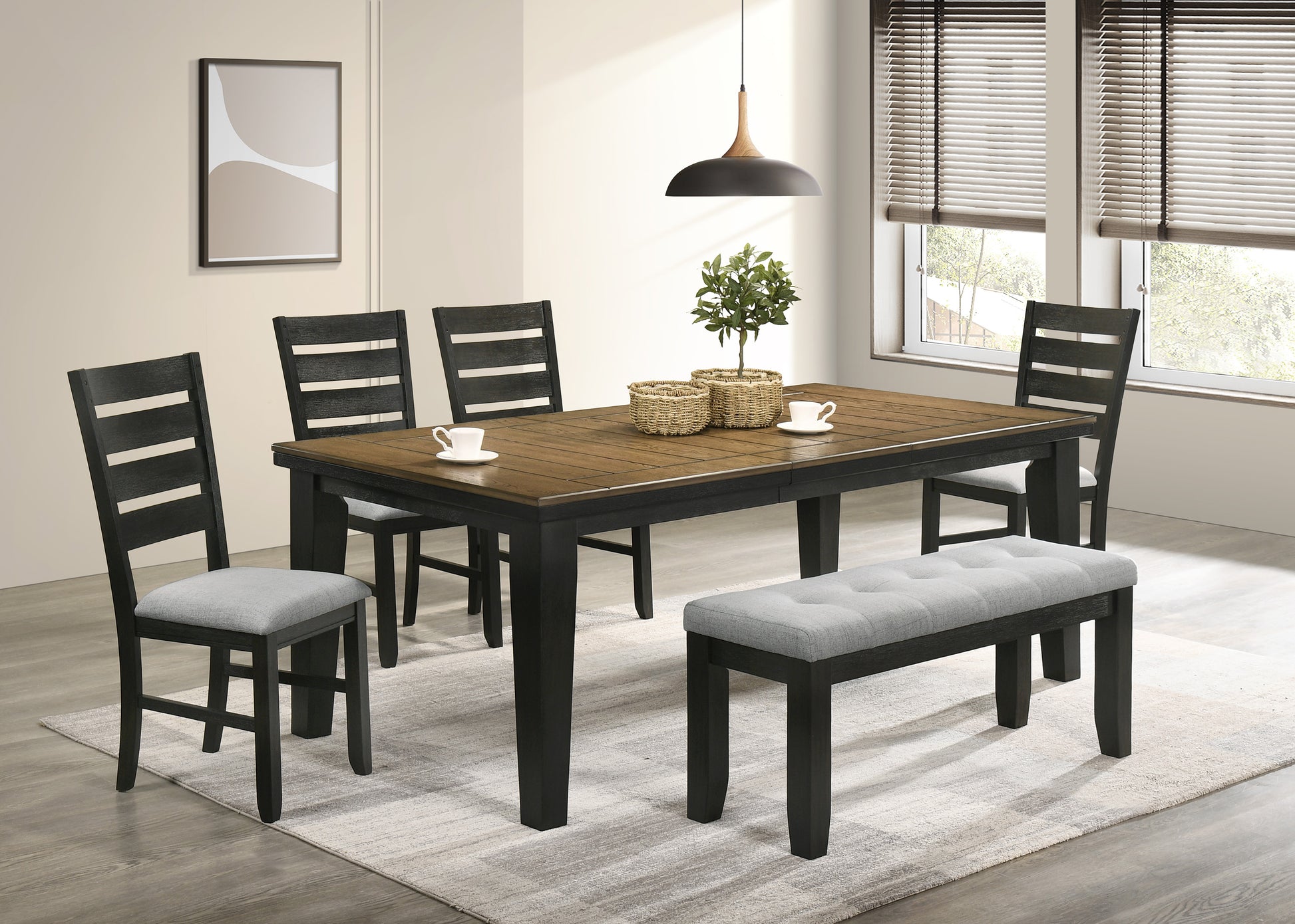Dark wood dining table with slatted black chairs and grey bench