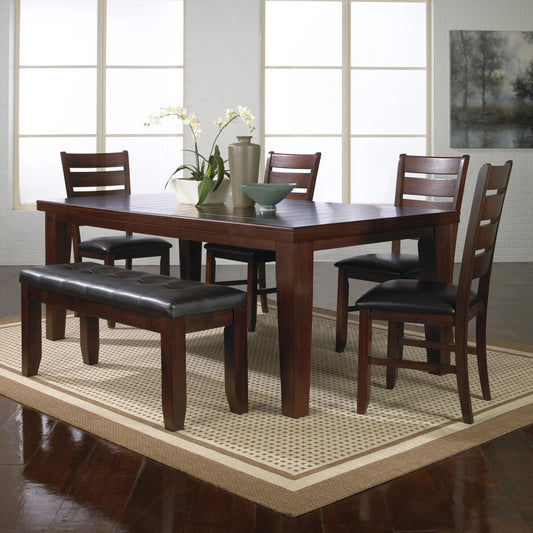 Dark brown wood dining table with tufted leather bench and chairs