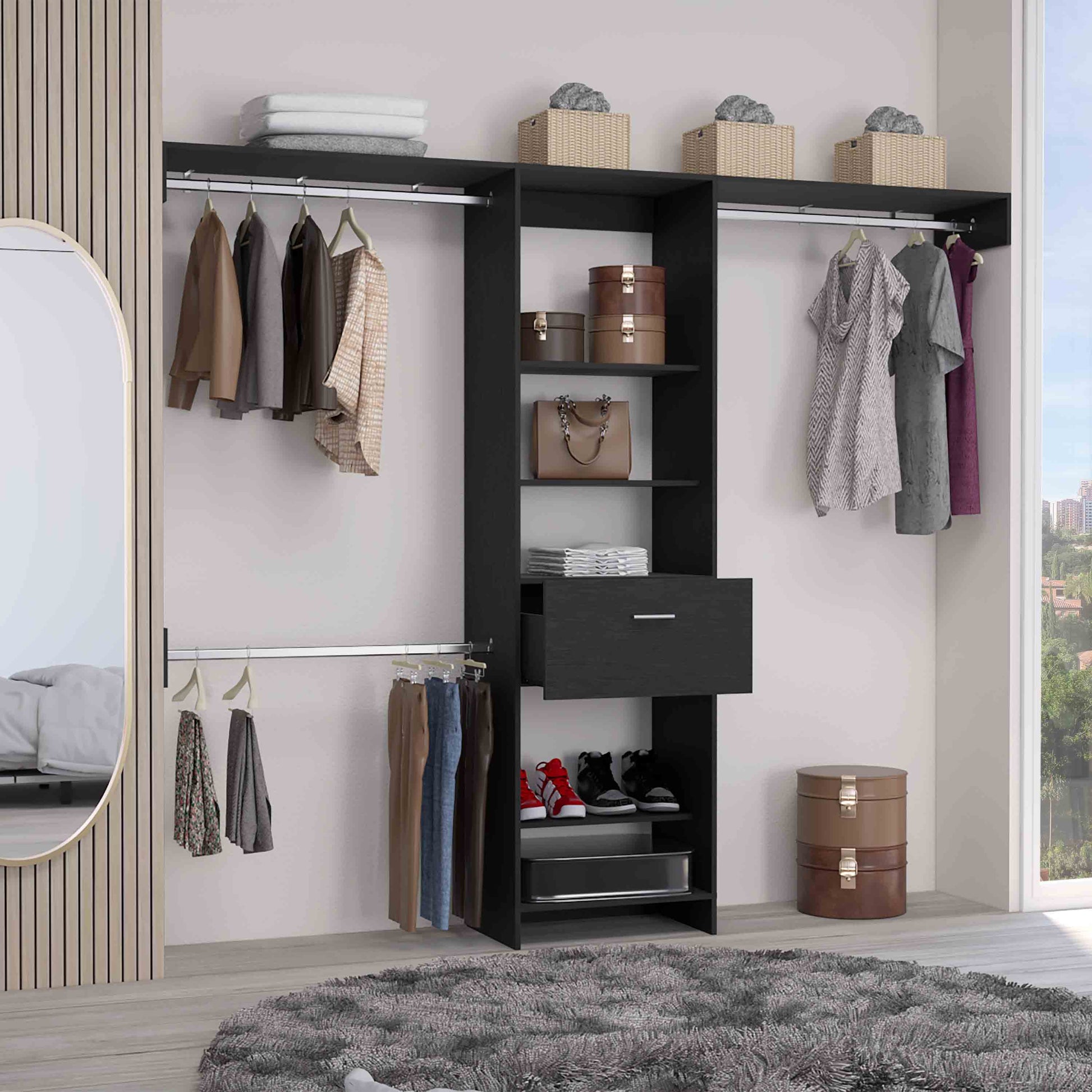 Black modular closet organizer with hanging clothes and shoes