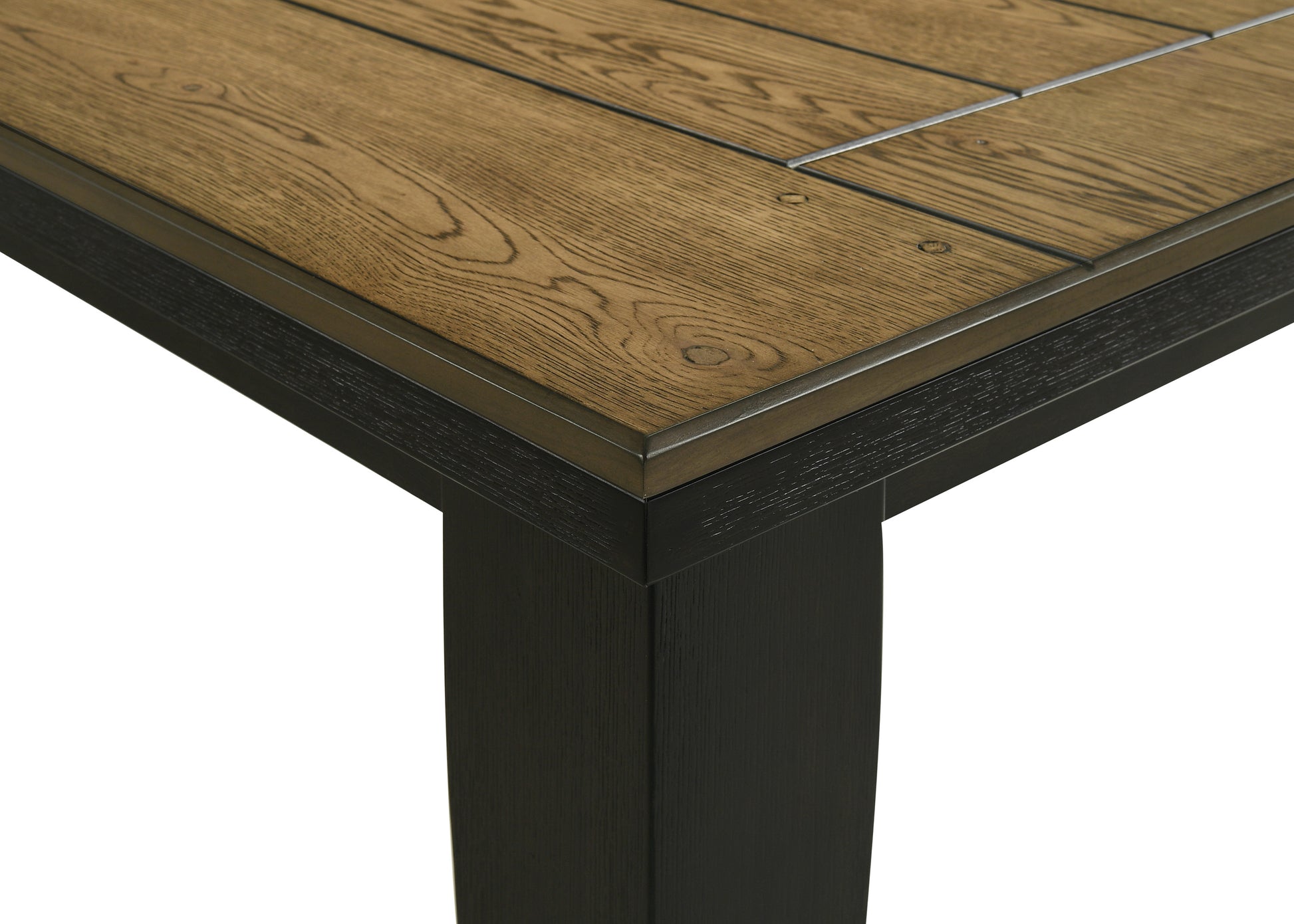 Closeup of a rustic wood table top with dark metal accents