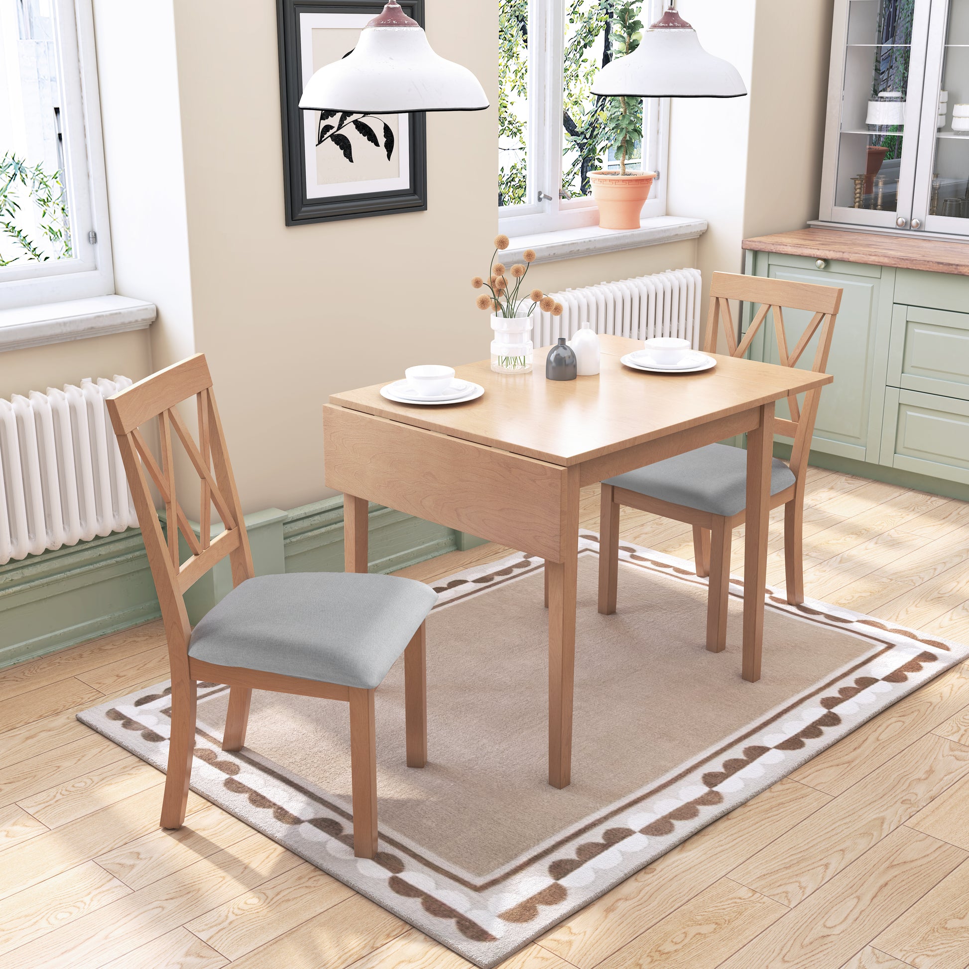 Light oak drop leaf dining table with upholstered chairs