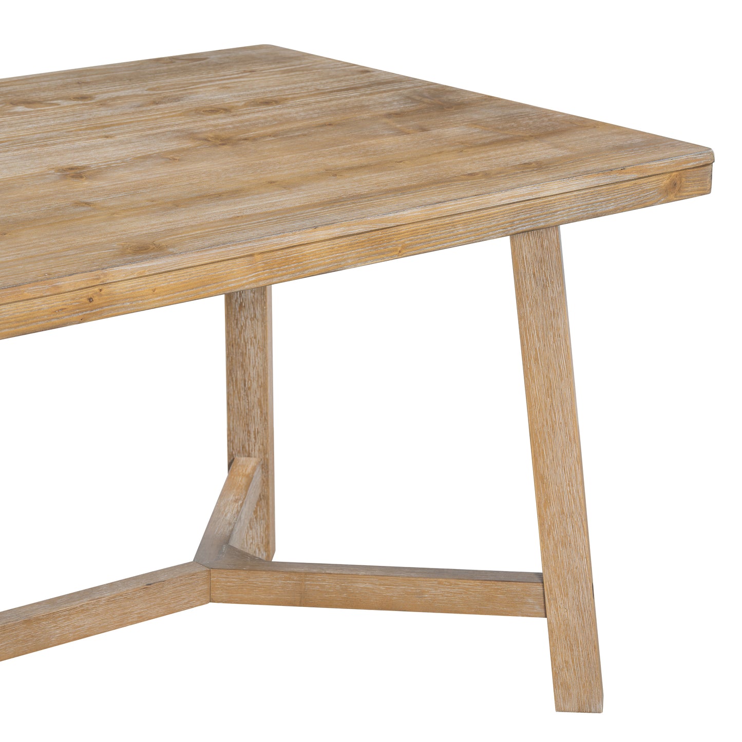 Close up of a rustic wooden dining table with a weathered finish