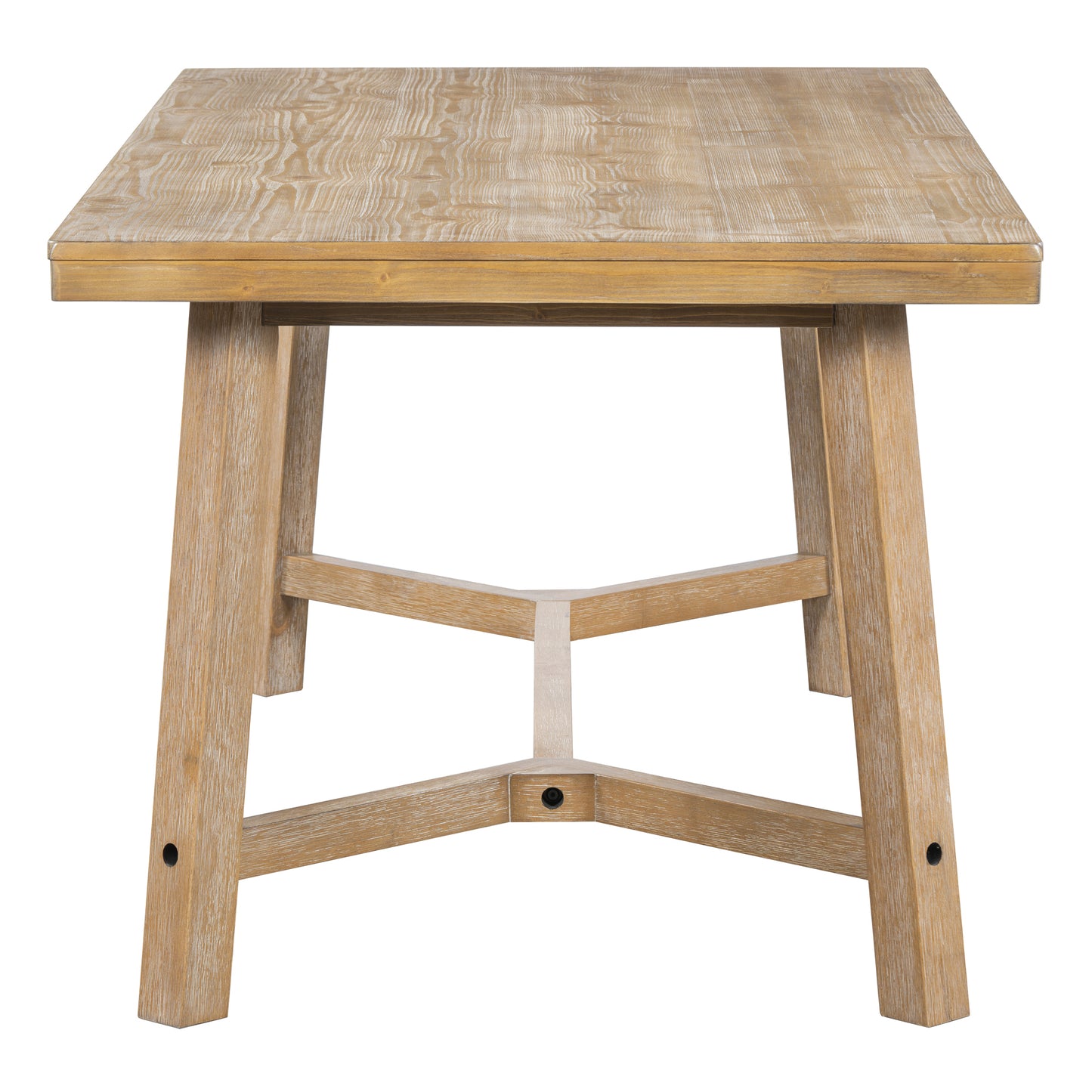 Rectangular wooden dining table with a natural distressed finish and unique crossed leg support