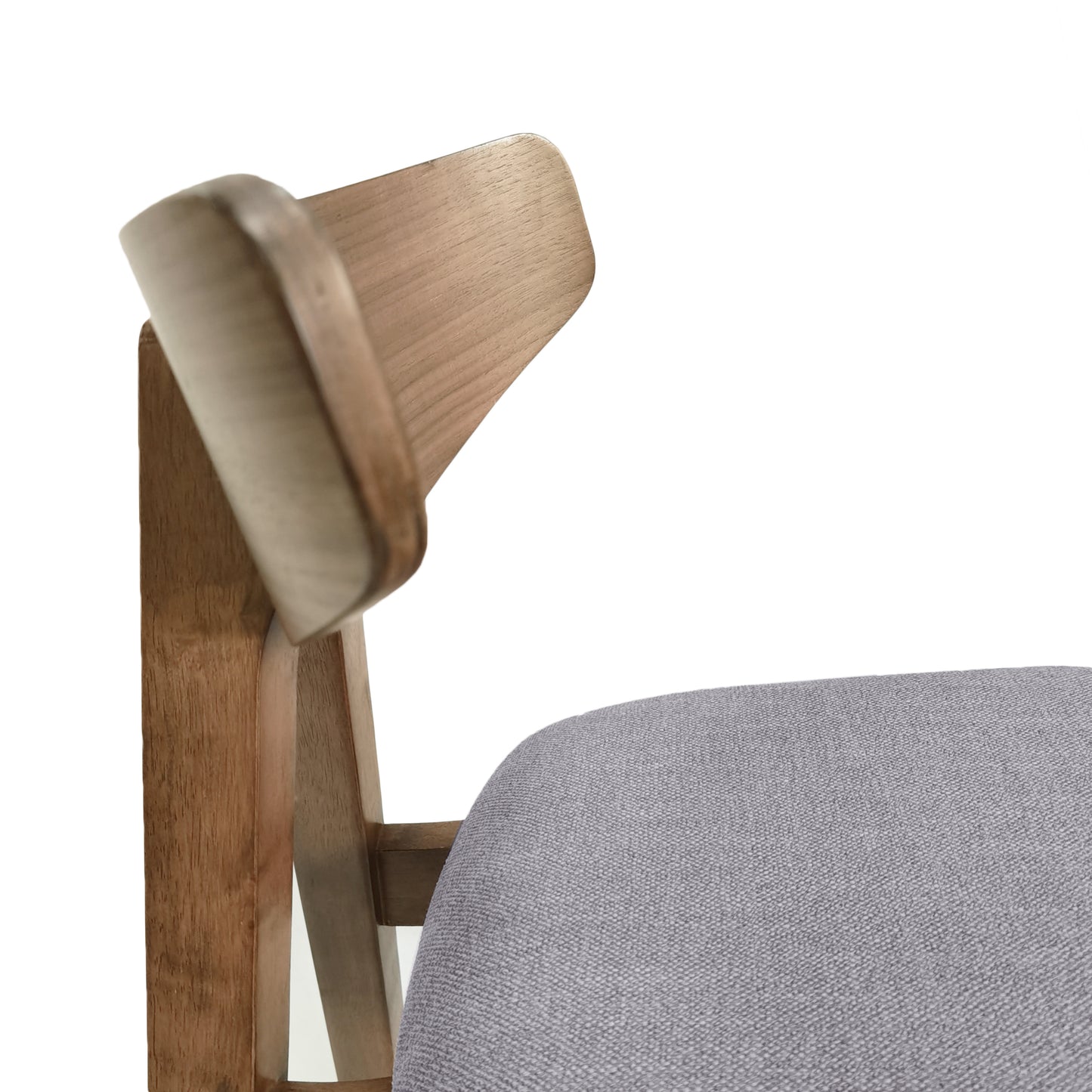 Closeup of a wooden chair back with a grey upholstered seat