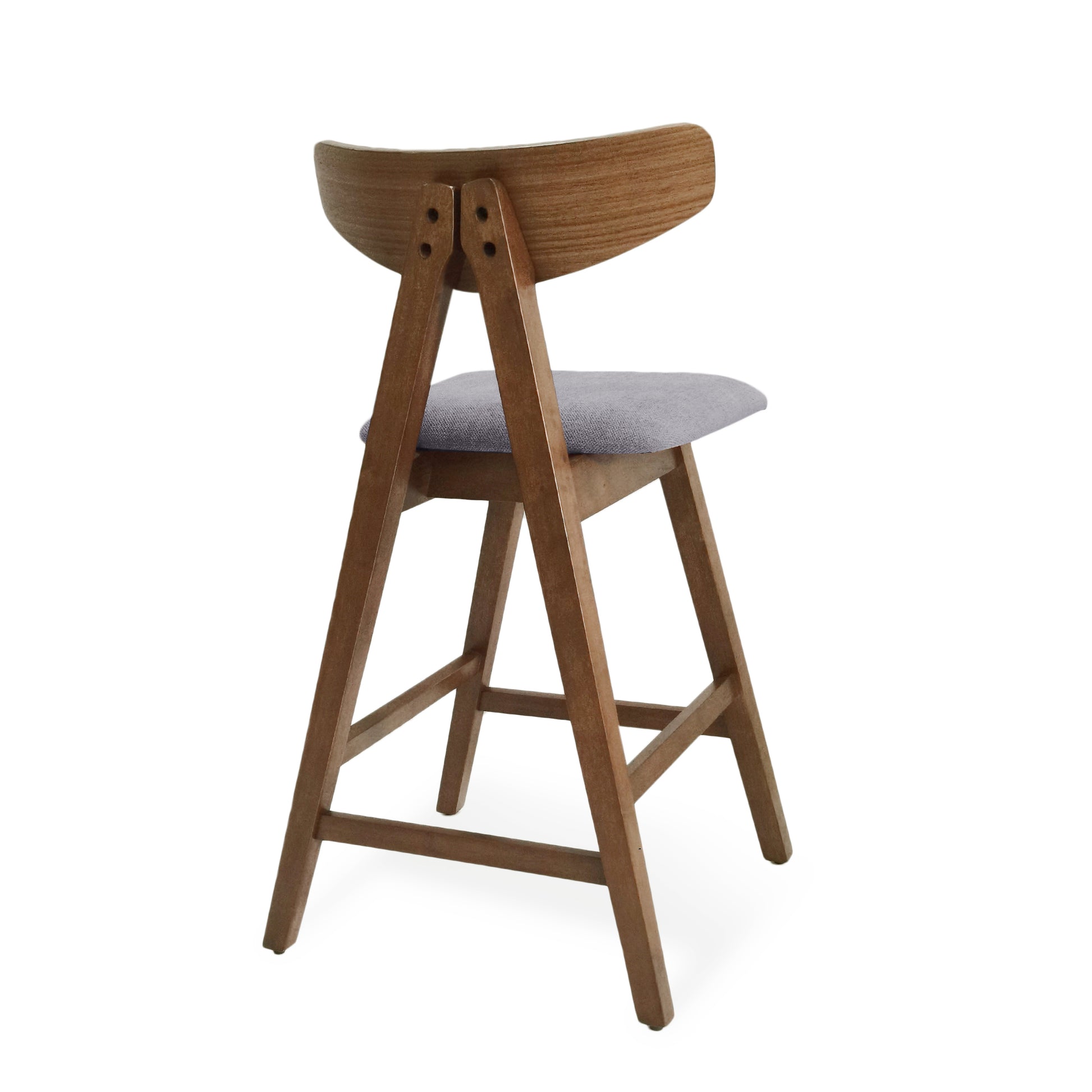 Wooden bar stool with grey upholstered seat and curved backrest