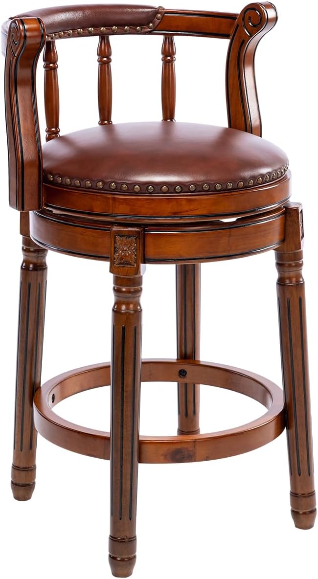 Brown leather swivel bar stool with nailhead trim and carved wood legs