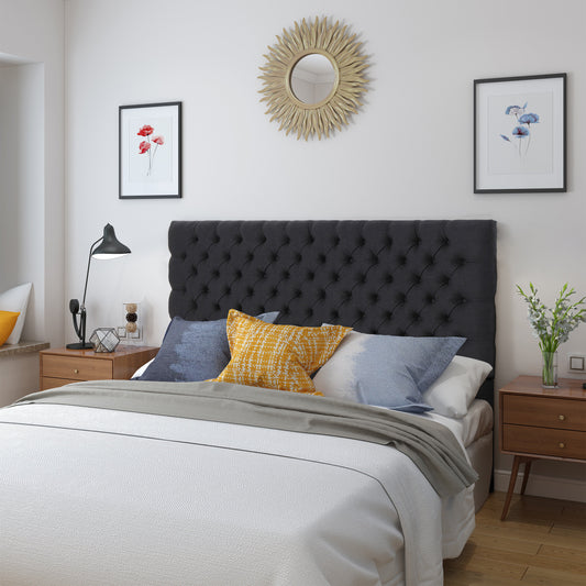 Dark grey tufted velvet headboard for a queen bed