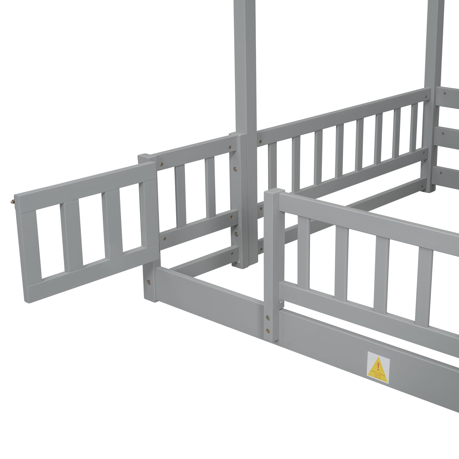 Gray wooden toddler bed frame with guardrails
