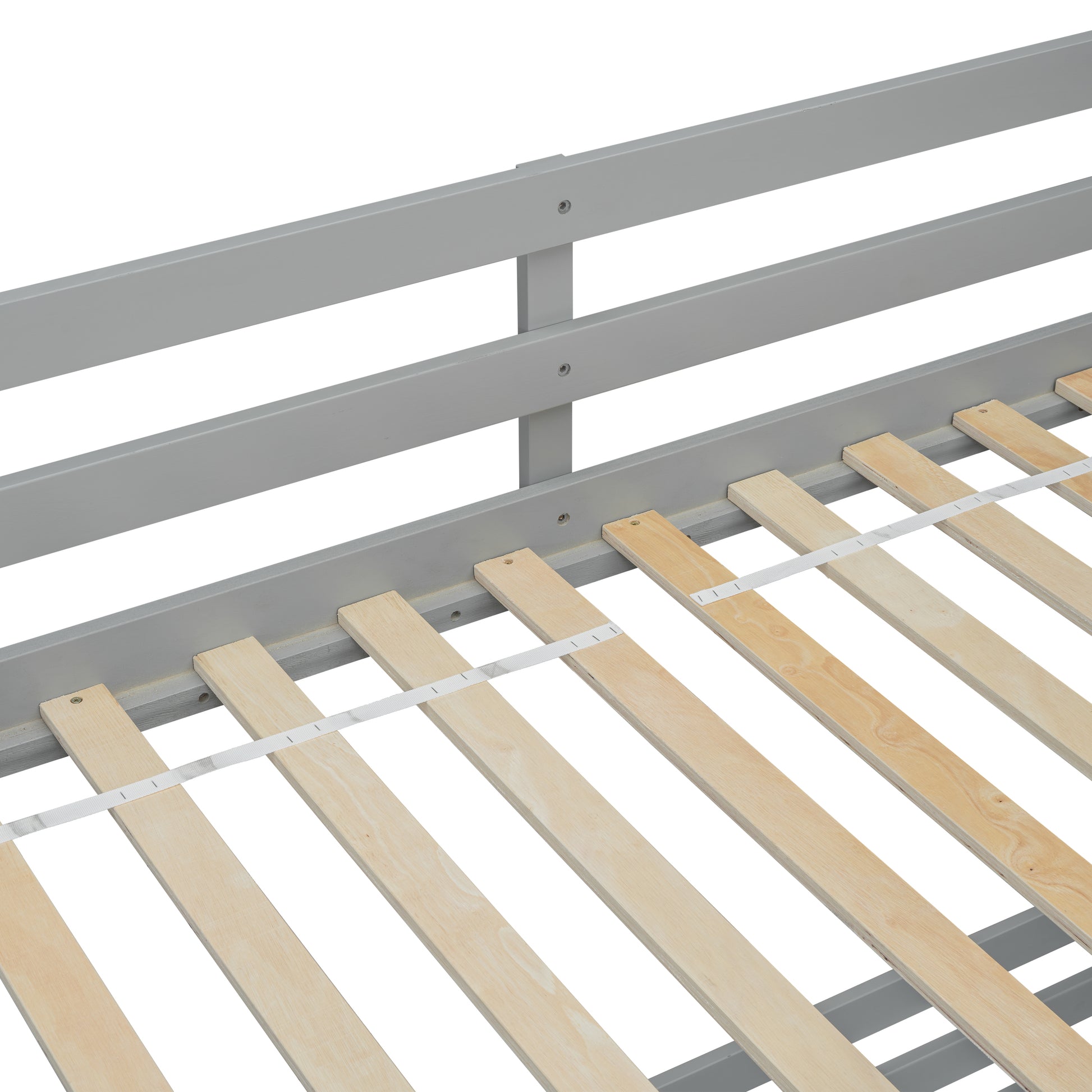 Gray metal bed frame detail with wooden slats for mattress support