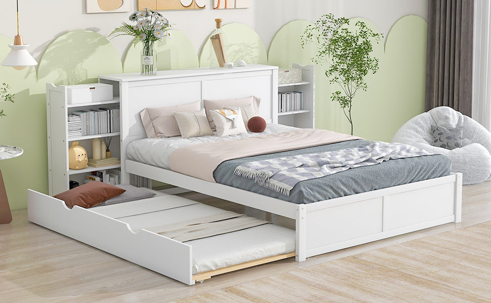 White wooden twin bed with pullout trundle and builtin bookshelf headboard