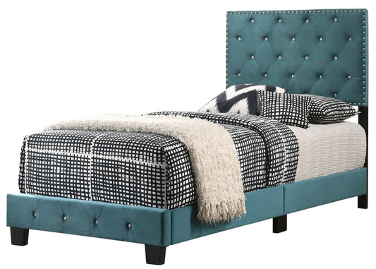 Teal velvet tufted twin bed with crystal buttons and geometric bedding