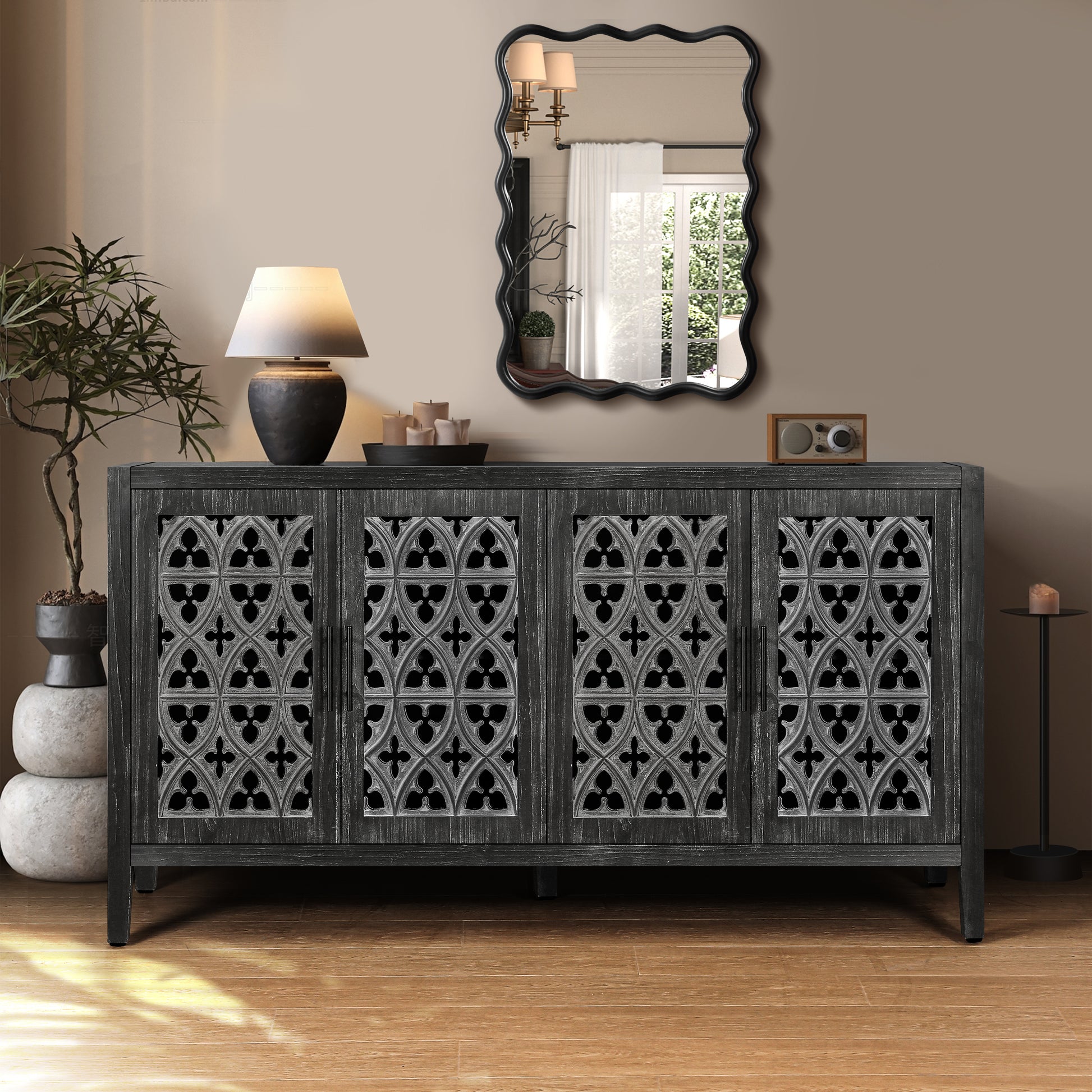 Dark gray distressed wood sideboard with ornate metal door inserts
