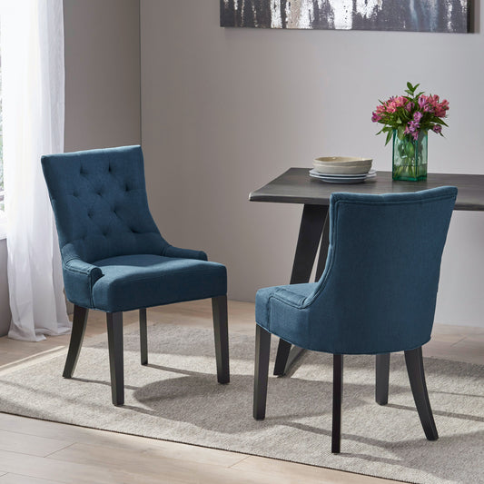 Tufted navy blue fabric dining chair with dark wooden legs