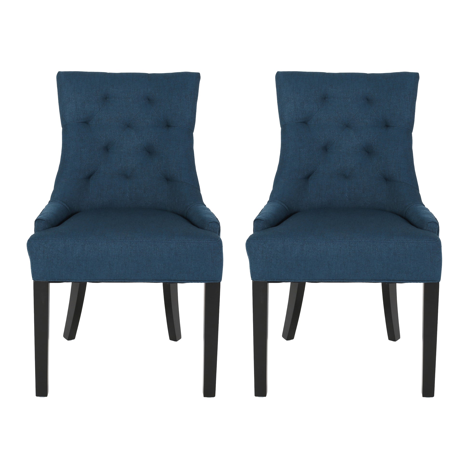 Two navy blue upholstered dining chairs with button tufting and dark wood legs