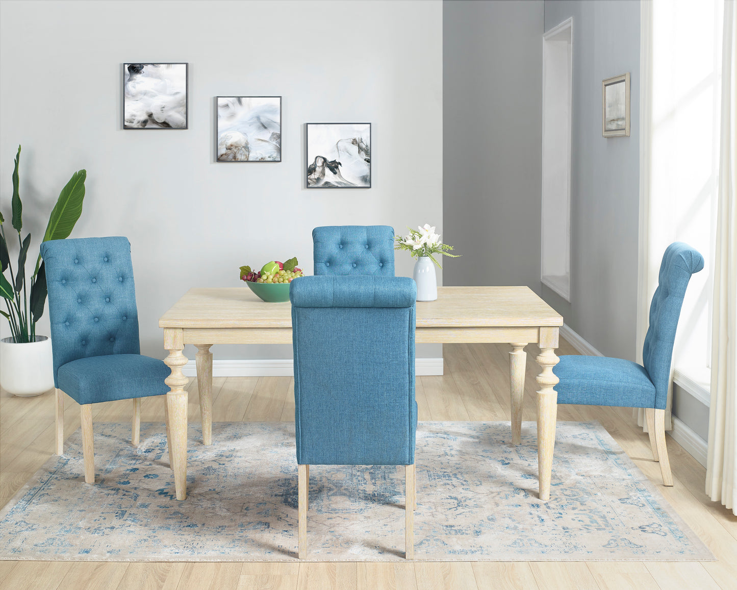Tufted blue upholstered dining chair with light wood legs