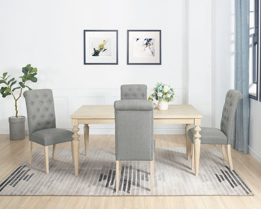 Tufted grey fabric dining chair with button detail on the back