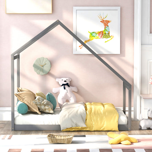 Gray wooden house frame toddler bed with colorful patterned deer art