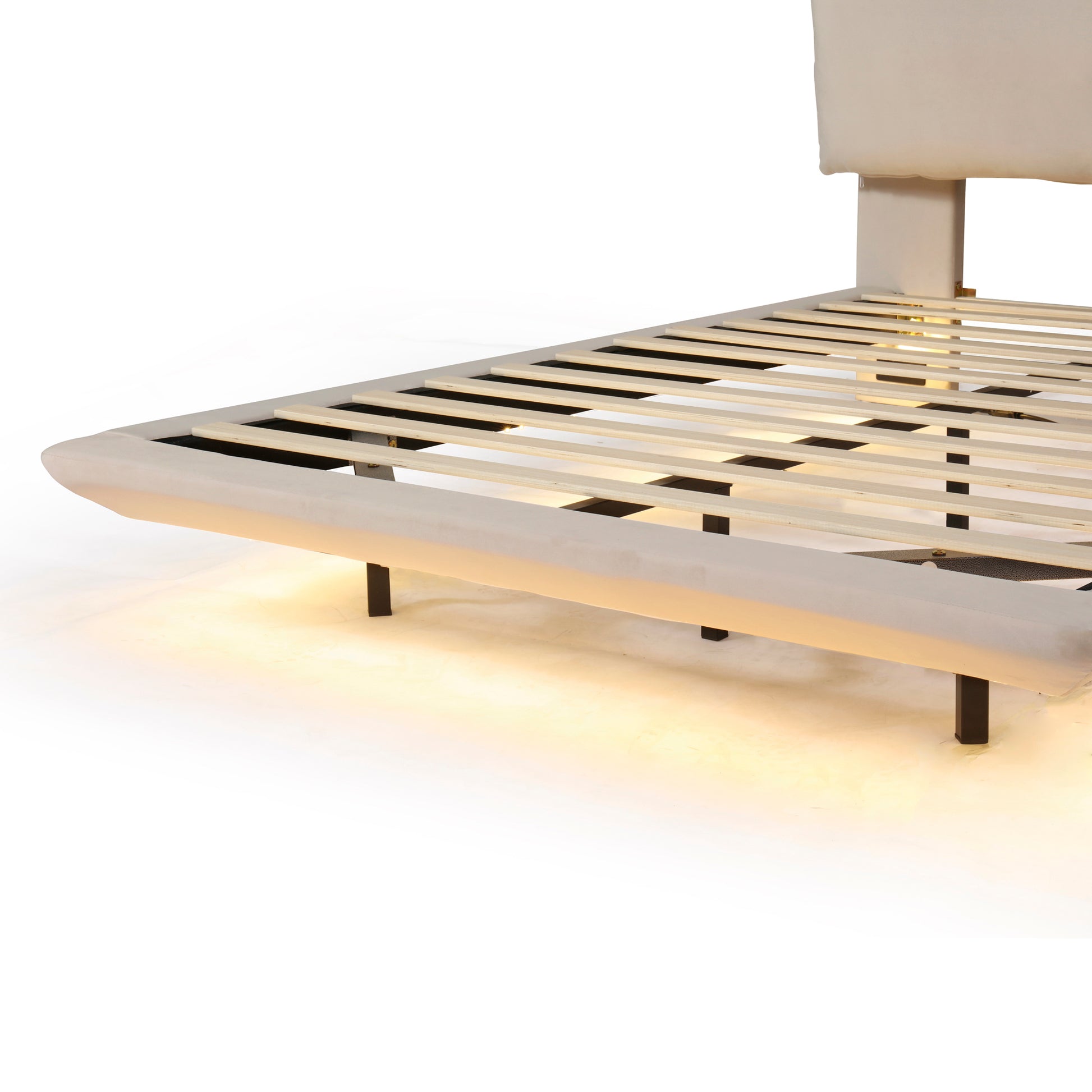 Beige upholstered bed frame with wooden slats and subtle underglow lighting