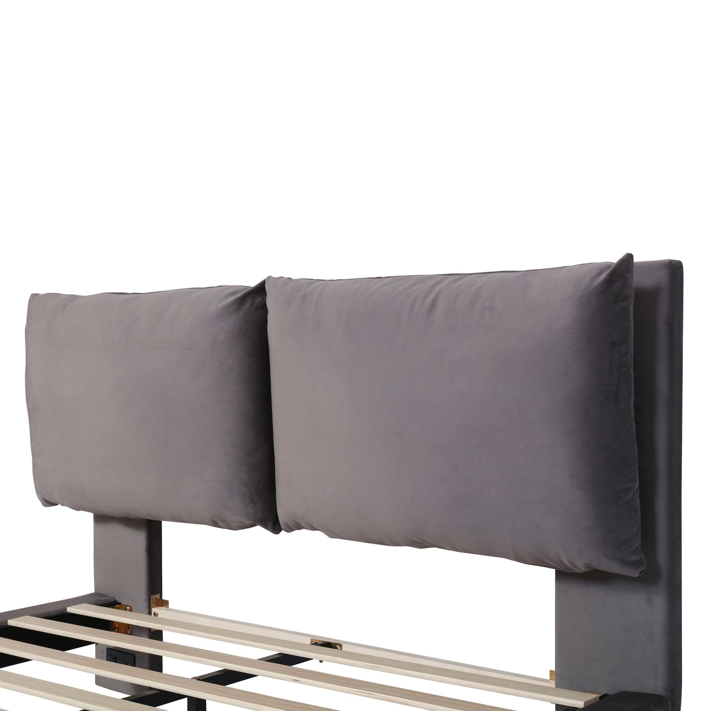 Grey velvet headboard with plush pillows