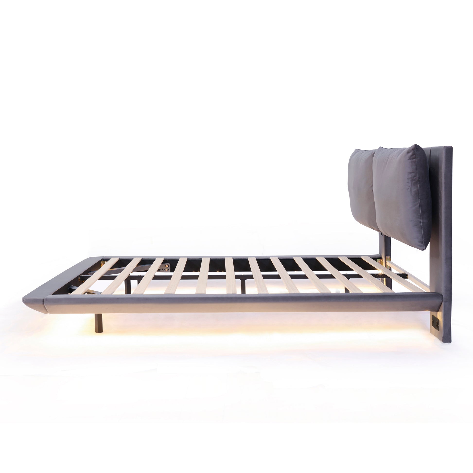 Modern grey velvet bed frame with integrated LED lighting and two plush headboard cushions