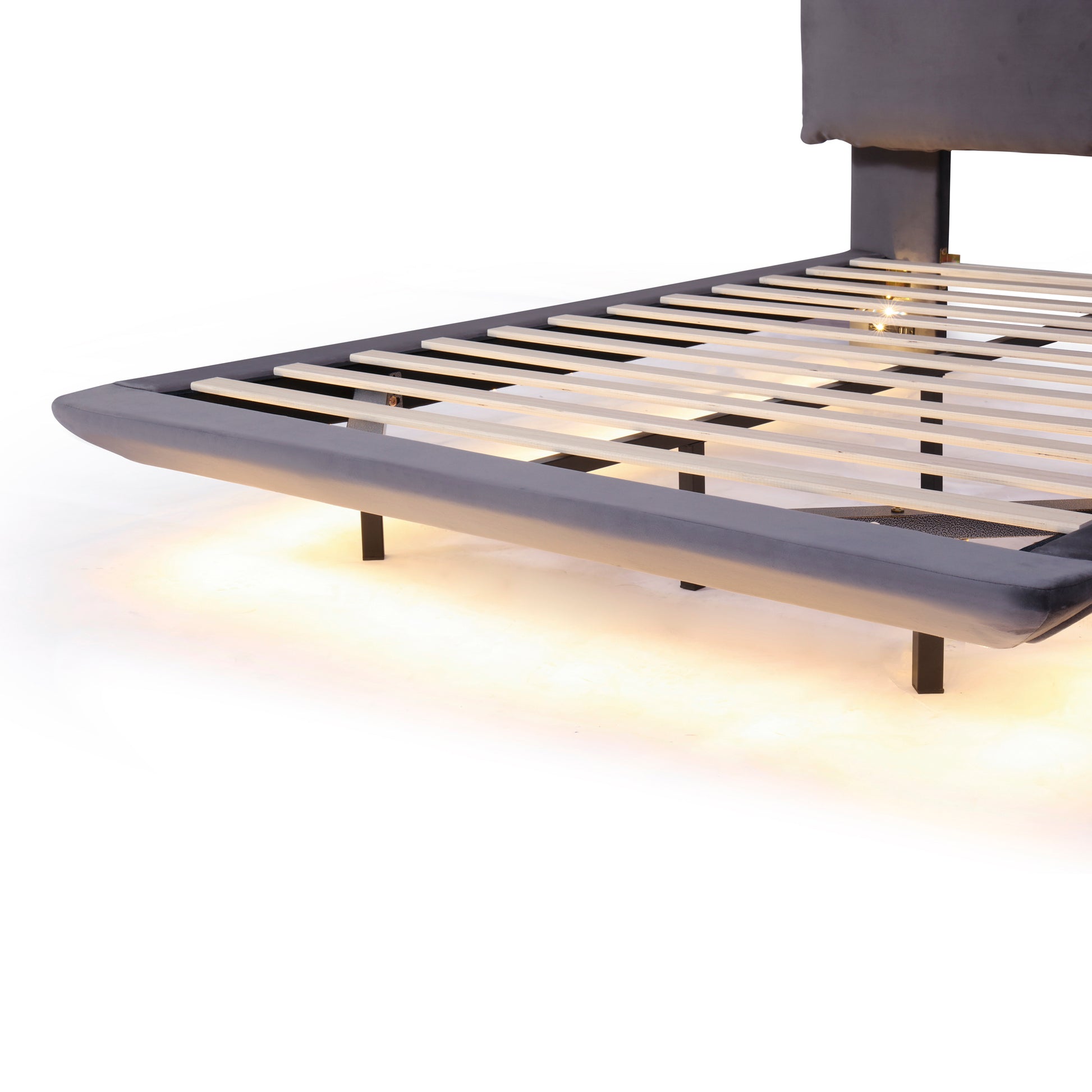Grey upholstered bed frame with slatted base and builtin LED lighting