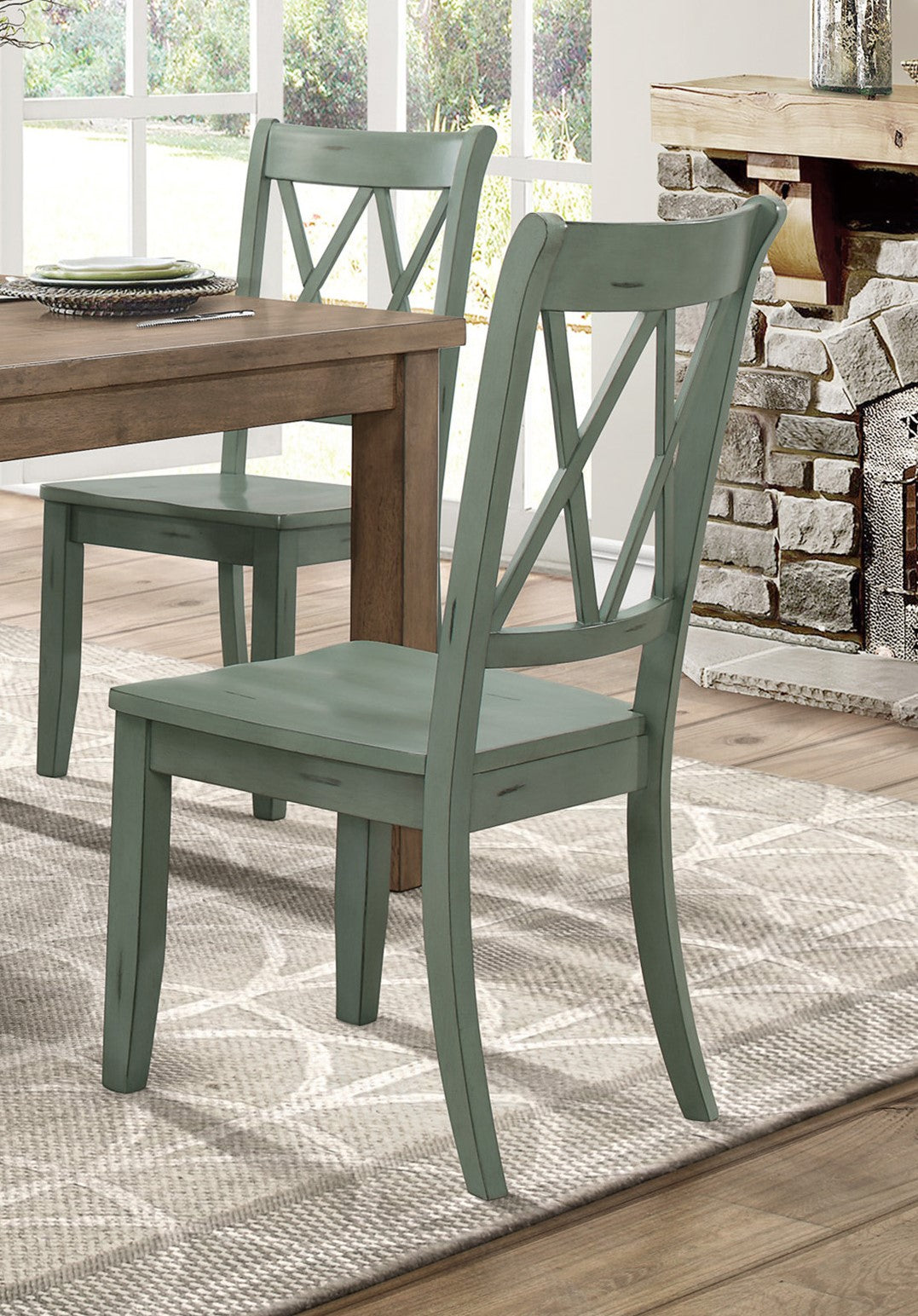 Sage green wooden dining chair with Xback design