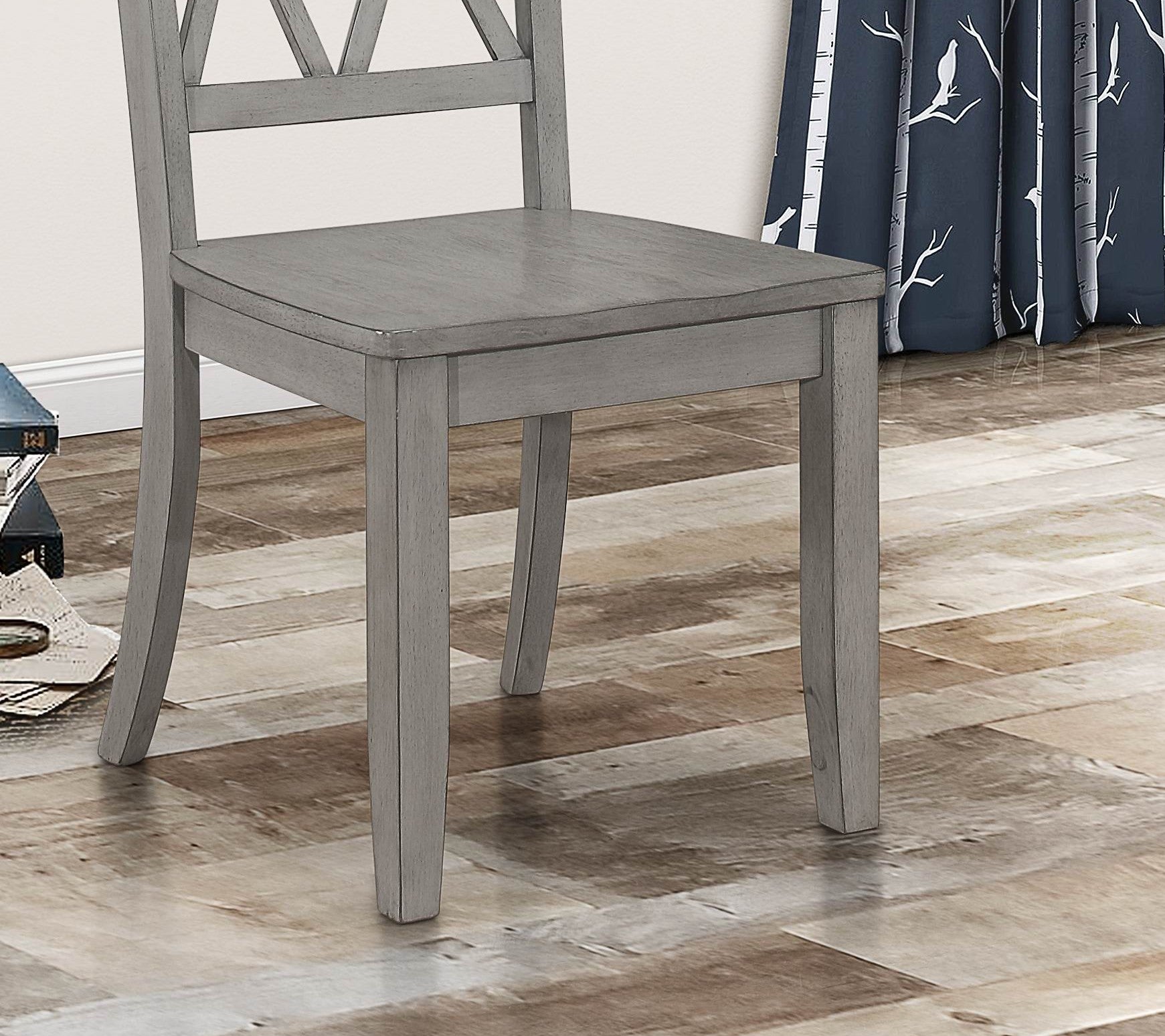 Gray wooden dining chair with crisscross back detail