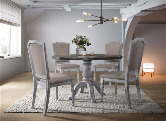 Farmhouse dining table set with four linen upholstered chairs
