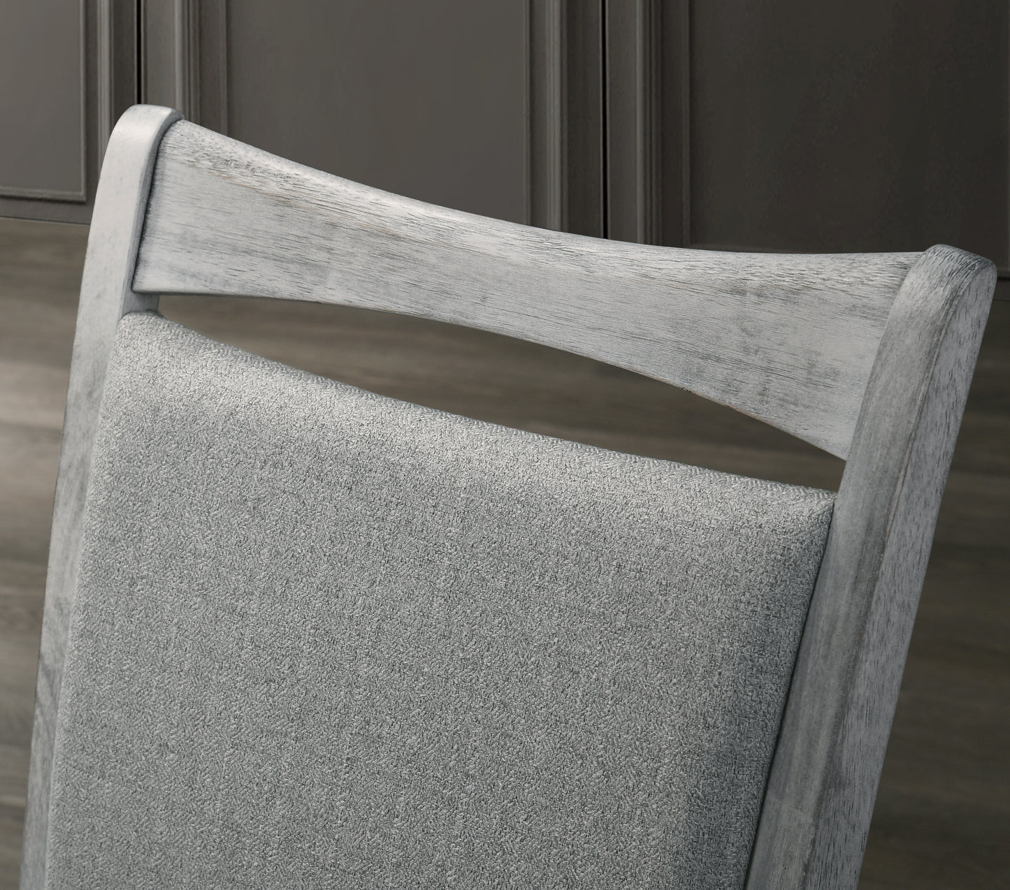 Rustic gray wooden chair with textured gray fabric seat