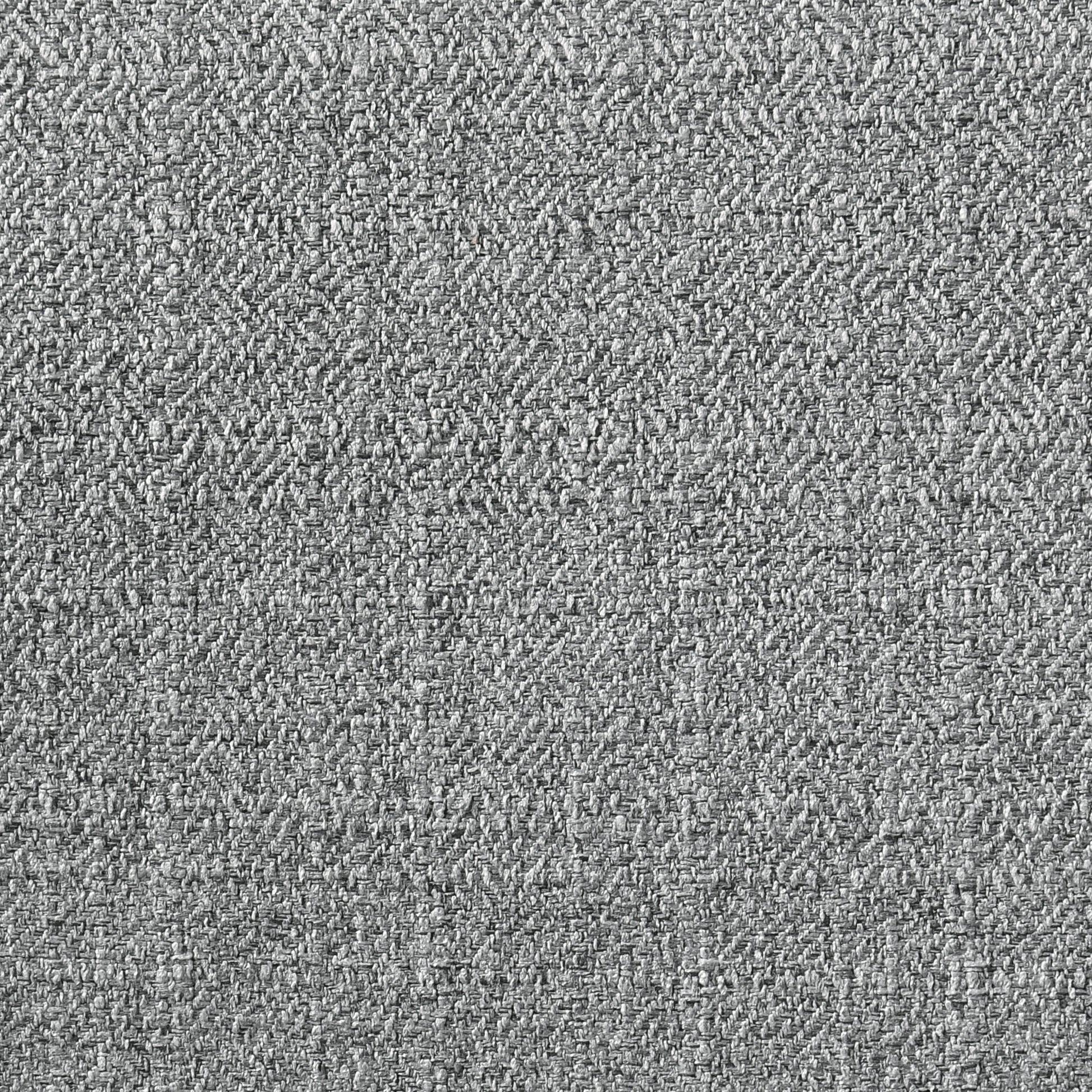 Closeup of grey tweed fabric with a herringbone pattern
