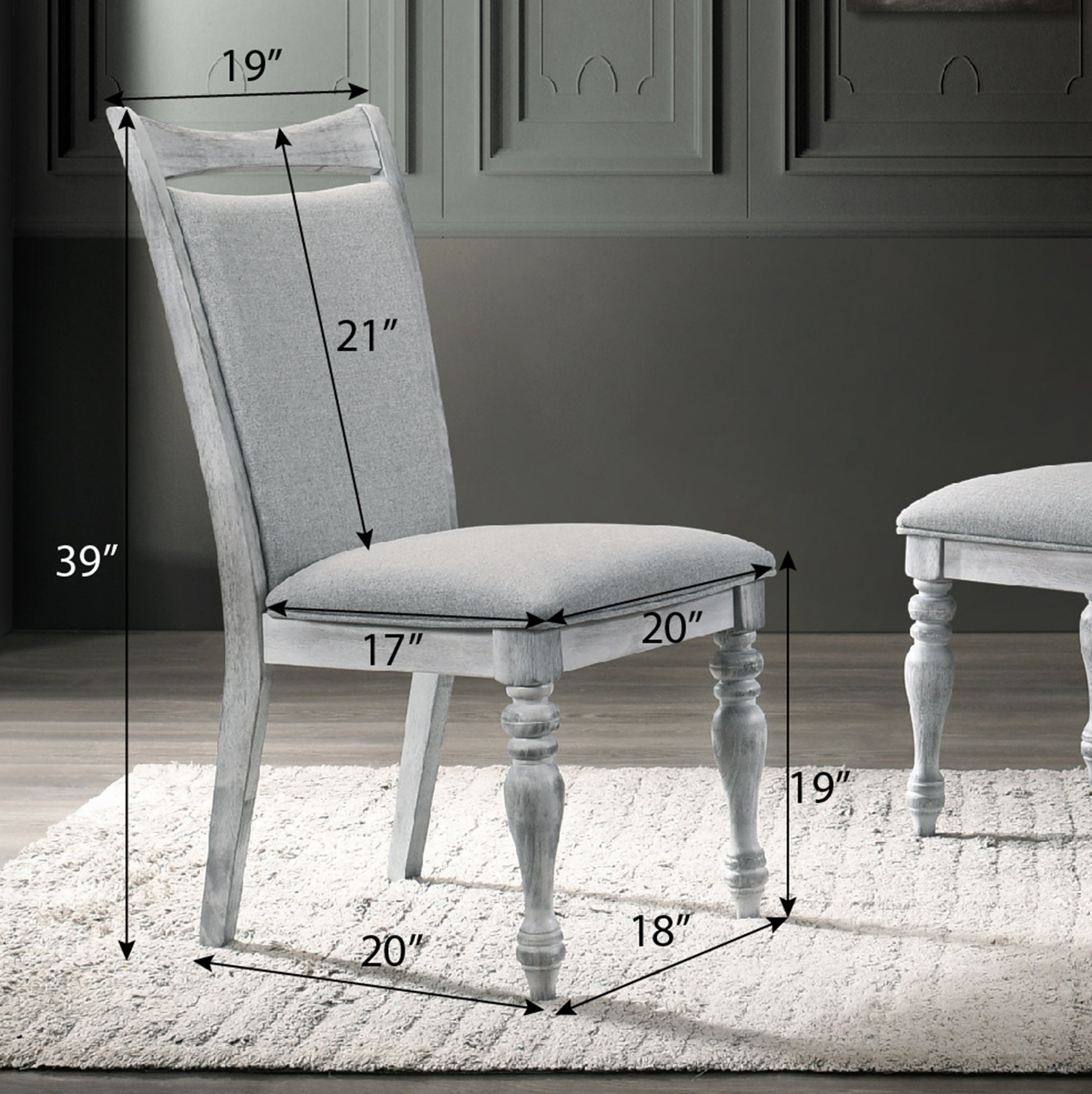 Upholstered dining chair with grey fabric and distressed wood frame