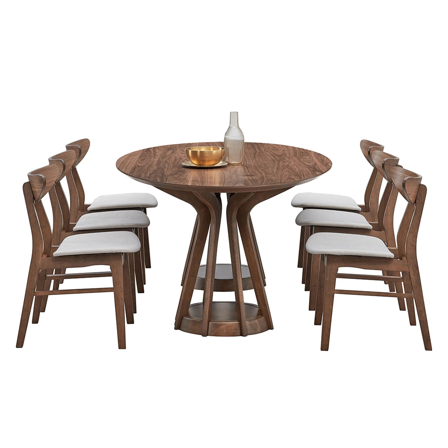Round walnut dining table with six upholstered chairs